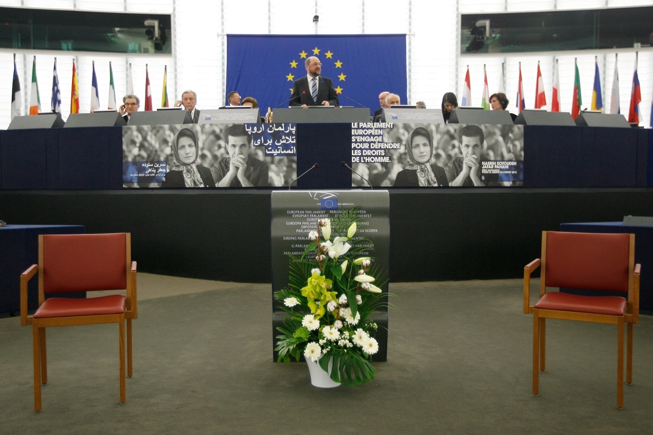 The president of the European Parliament delivers a speech in front of two empty chairs during the Sakharov Prize ceremony in Strasbourg, 12 December 2012. Iranian human rights lawyer Nasrin Sotoudeh, pictured, was one of the honourees, REUTERS/Jean-Marc Loos