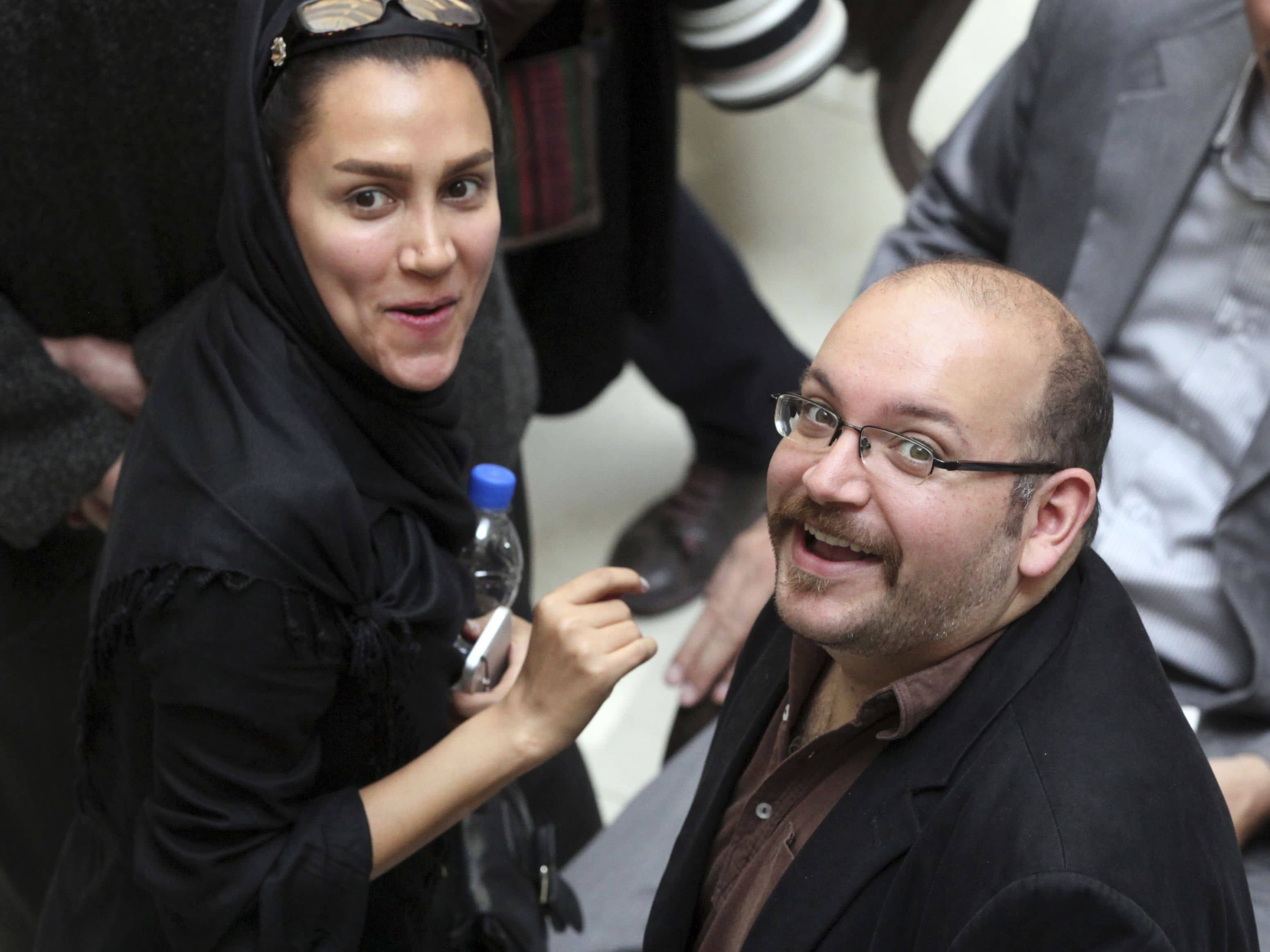 In this April 11, 2013 file photo, Jason Rezaian, right, an Iranian-American correspondent for the Washington Post, and his wife Yeganeh Salehi, AP Photo/Vahid Salemi, File