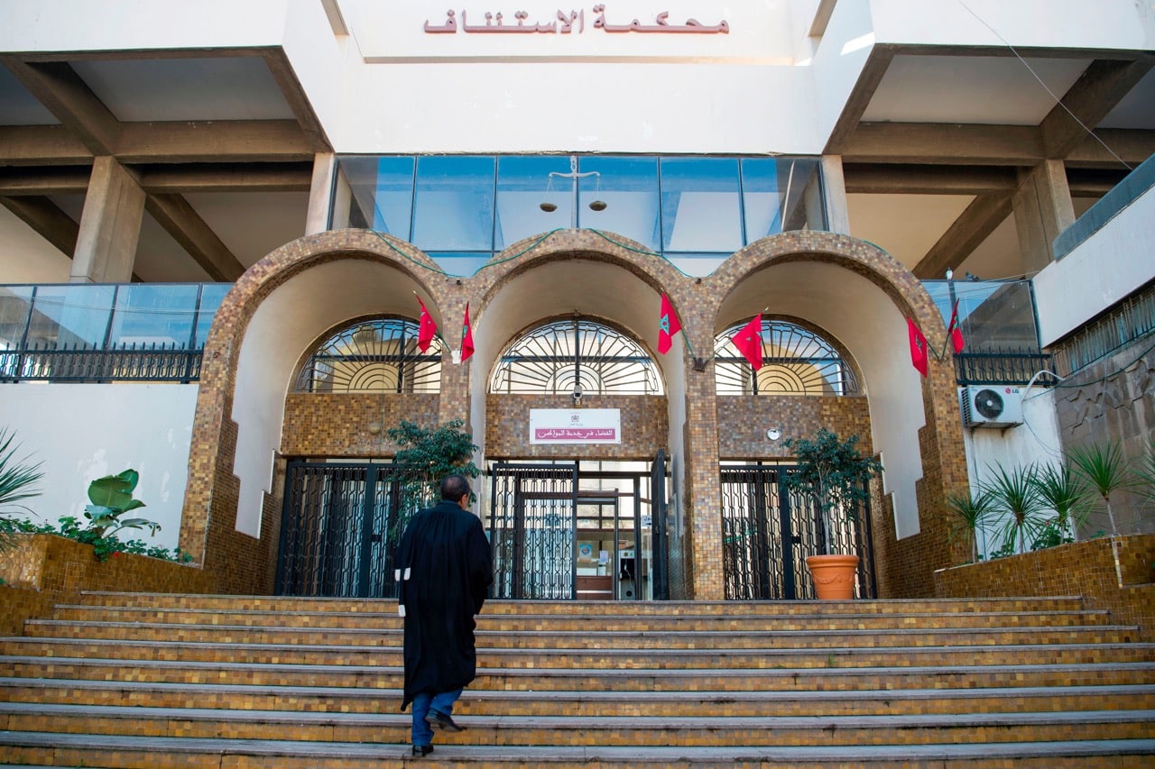 A man enters the court of appeal in the Moroccan city of Casablanca, 5 January 2018 , FADEL SENNA/AFP/Getty Images