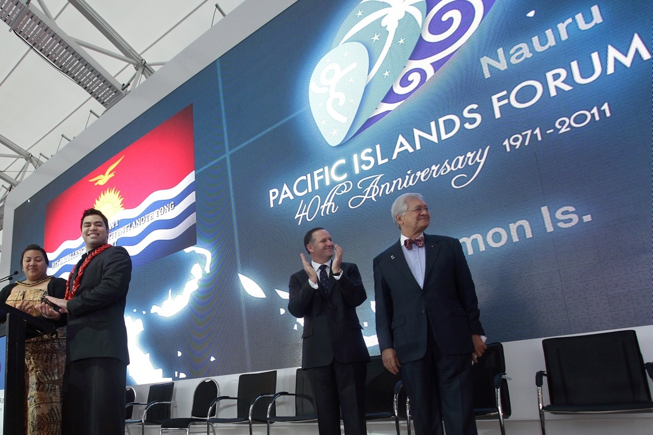 New Zealand Prime Minister John Key (2nd R) and the Pacific Island Forum secretariat and secretary general, Tuiloma Neroni Slade (R), welcome other leaders on stage during the opening of the forum in Auckland, New Zealand, 7 September 2011, Bradley AMBROSE/AFP/Getty Images