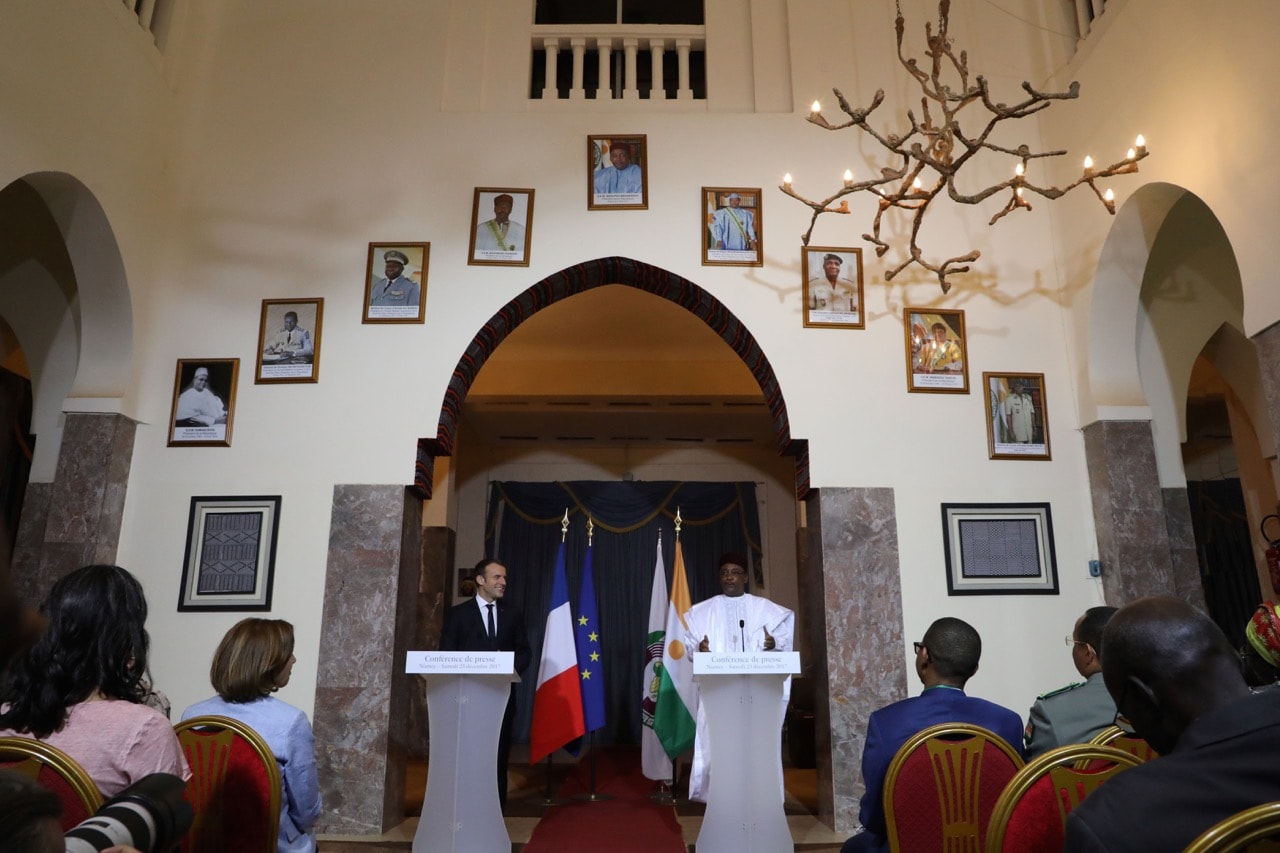 Niger's President Mahamadou Issoufou (R) and French president Emmanuel Macron (L) give a joint press conference after a meeting at the Presidential palace in Niamey, 23 December 2017, LUDOVIC MARIN/AFP/Getty Images