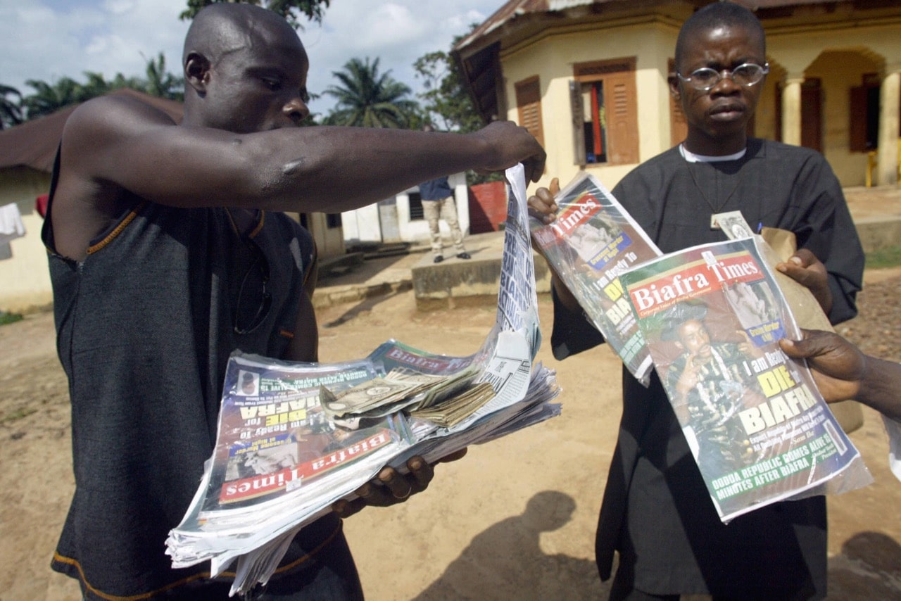 A vendor sells Biafran newspapers and magazines in Okwe, southeastern Nigeria, 19 August 2005, PIUS UTOMI EKPEI/AFP/Getty Images