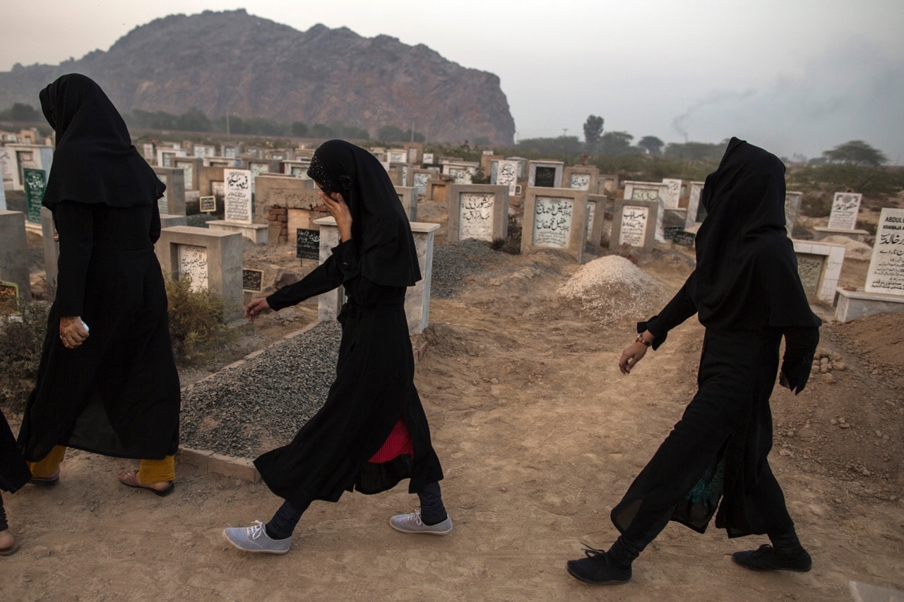 Ahmadi women at the Ahmadi graveyard in the town of Rabwa, 9 December 2013; journalist Rana Tanveer reports on religious minorities in Pakistan, such as the Ahmadis, REUTERS/Zohra Bensemra