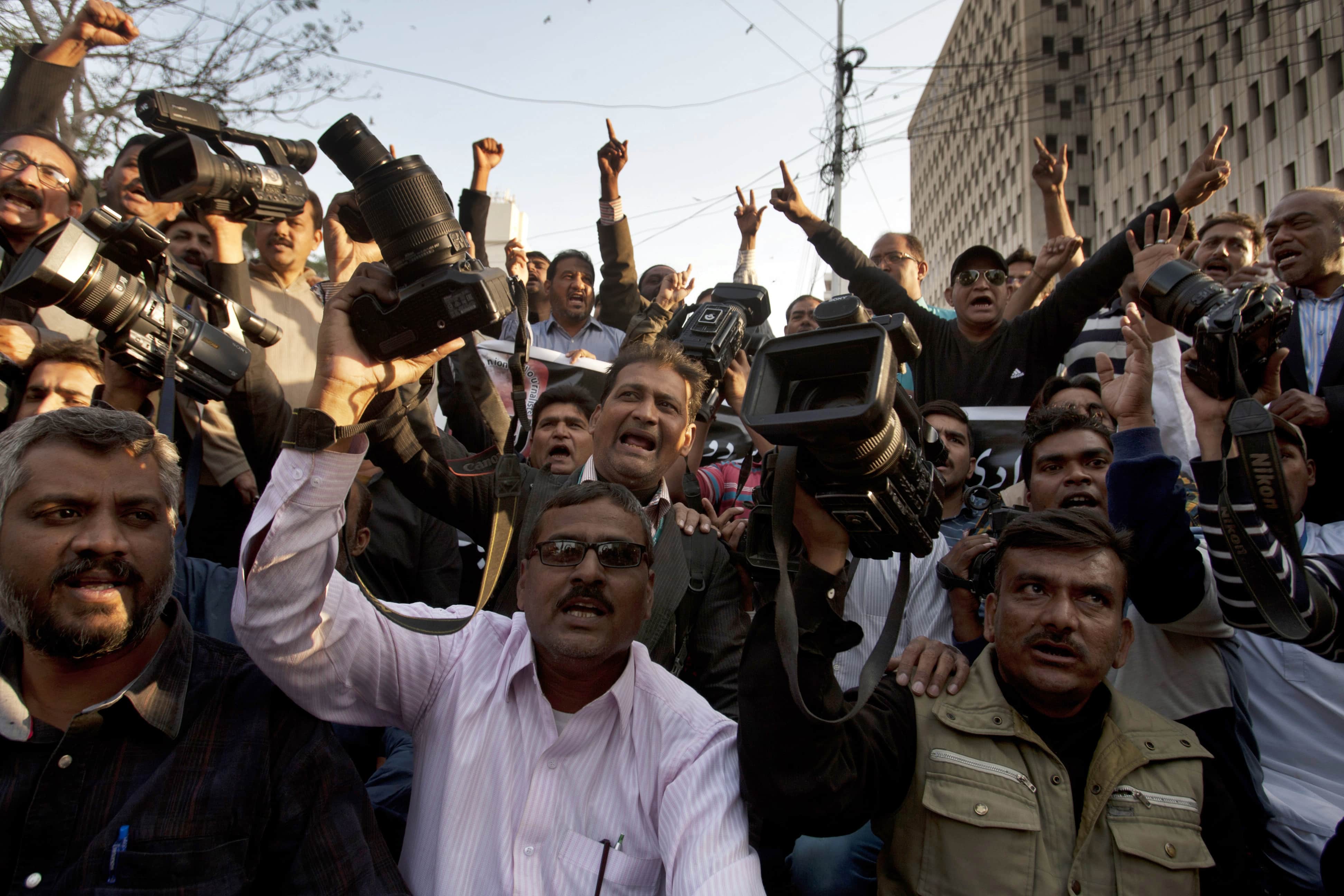 Journalists protest the death of Tamour Khan, a satellite technician for SAMAA TV, in Karachi, Pakistan, 13 February 2017, AP Photo/Shakil Adil