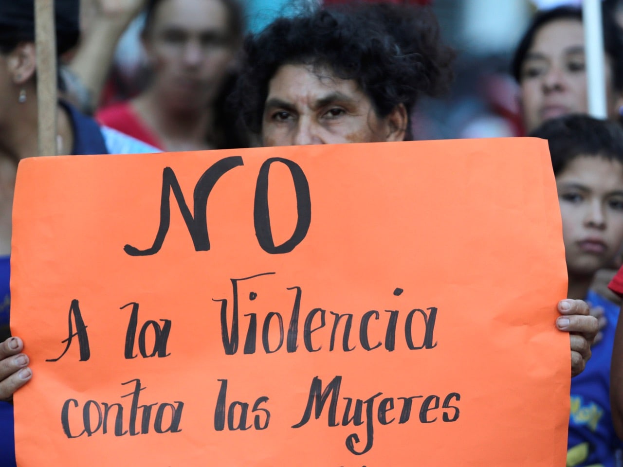 A placard that reads "No to violence against women" is displayed on International Women's Day, in Asuncion, Paraguay, 8 March 2017, REUTERS/Jorge Adorno