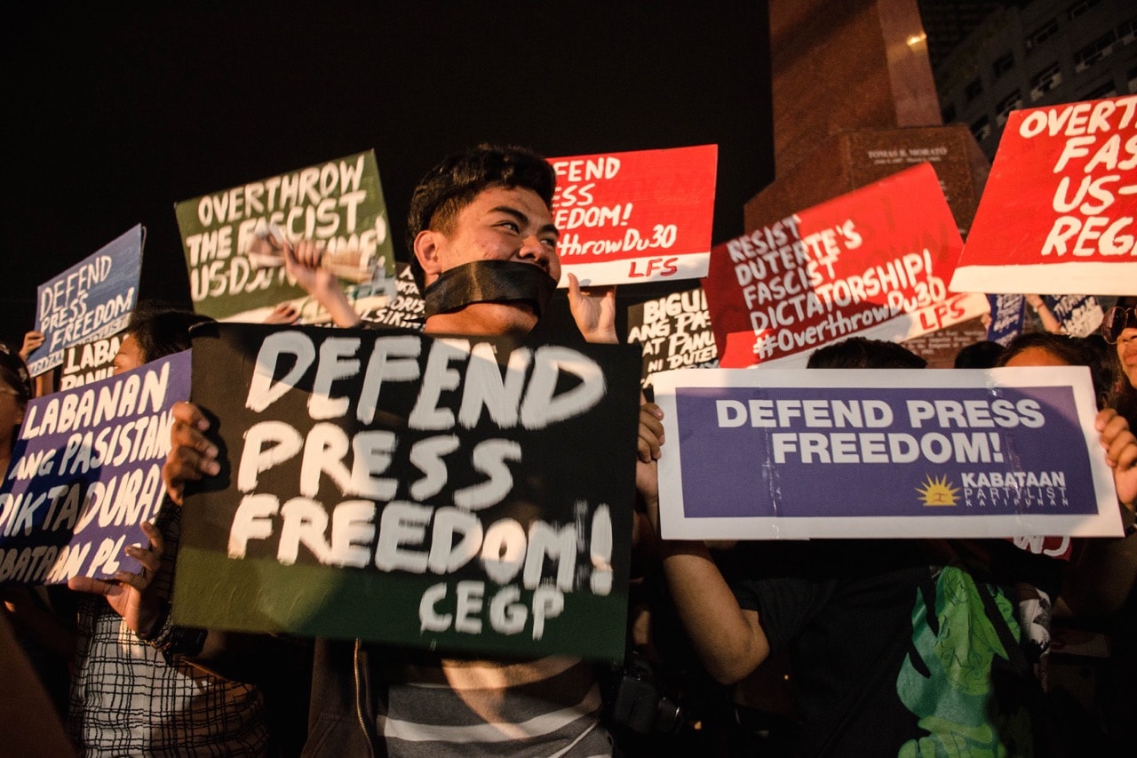 Activists join journalists in a protest for press freedom and against the revocation of the license of media outlet Rappler, in Manila, Philippines, 19 January 2018, Bernice Beltran/NurPhoto via Getty Images