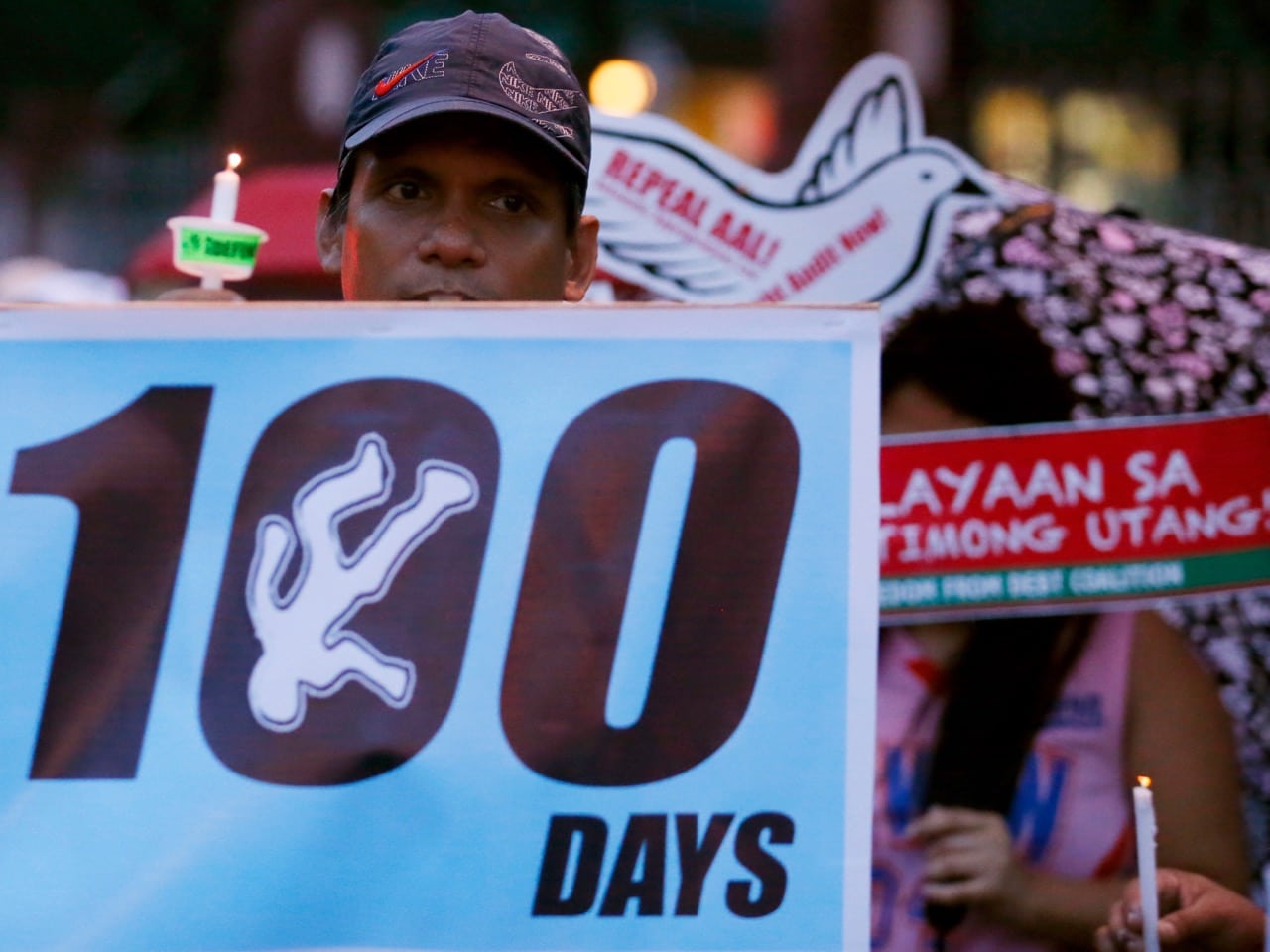 A candlelit protest against the extrajudicial killings in President Rodrigo Duterte's "War on Drugs" campaign in Quezon city, northeast of Manila, Philippines, 8 October 2016, AP Photo/Bullit Marquez