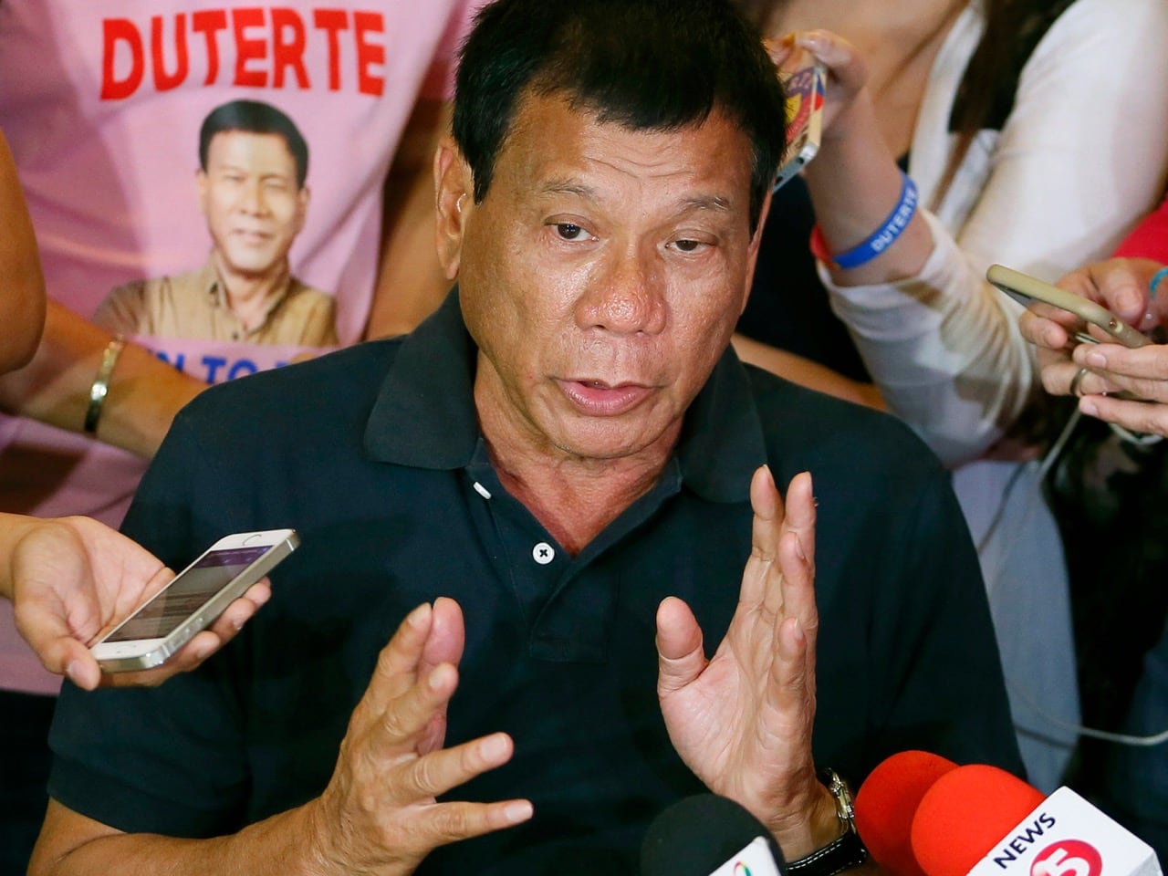 In this 29 April 2016 file photo, then presidential candidate Rodrigo Duterte answers questions from the media in Manila, AP Photo/Bullit Marquez, File