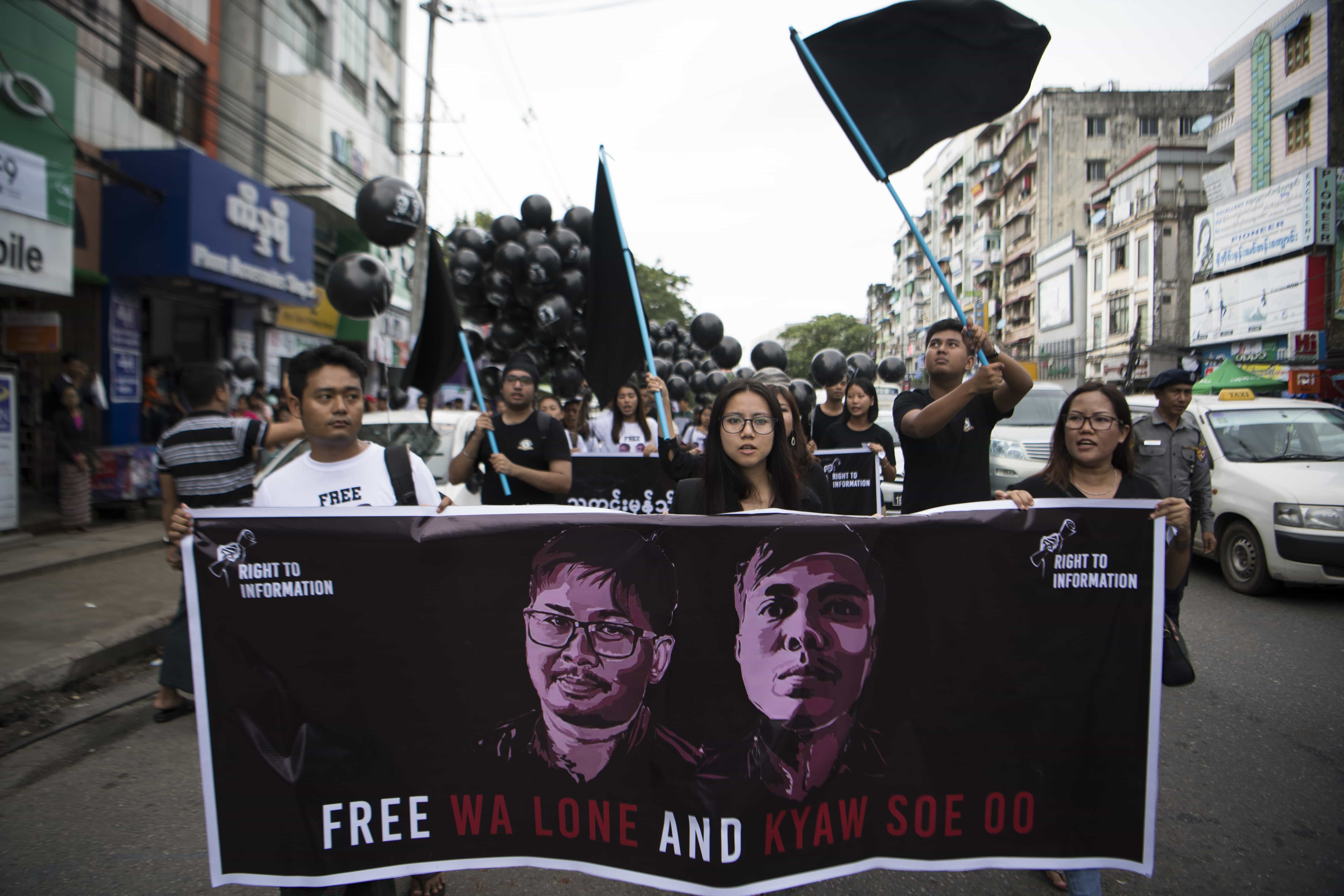 Supporters of detained journalists Wa Lone and Kyaw Soe Oo march during a rally in Yangon, Burma demanding for their release, 1 September 2018,  -/AFP/Getty Images