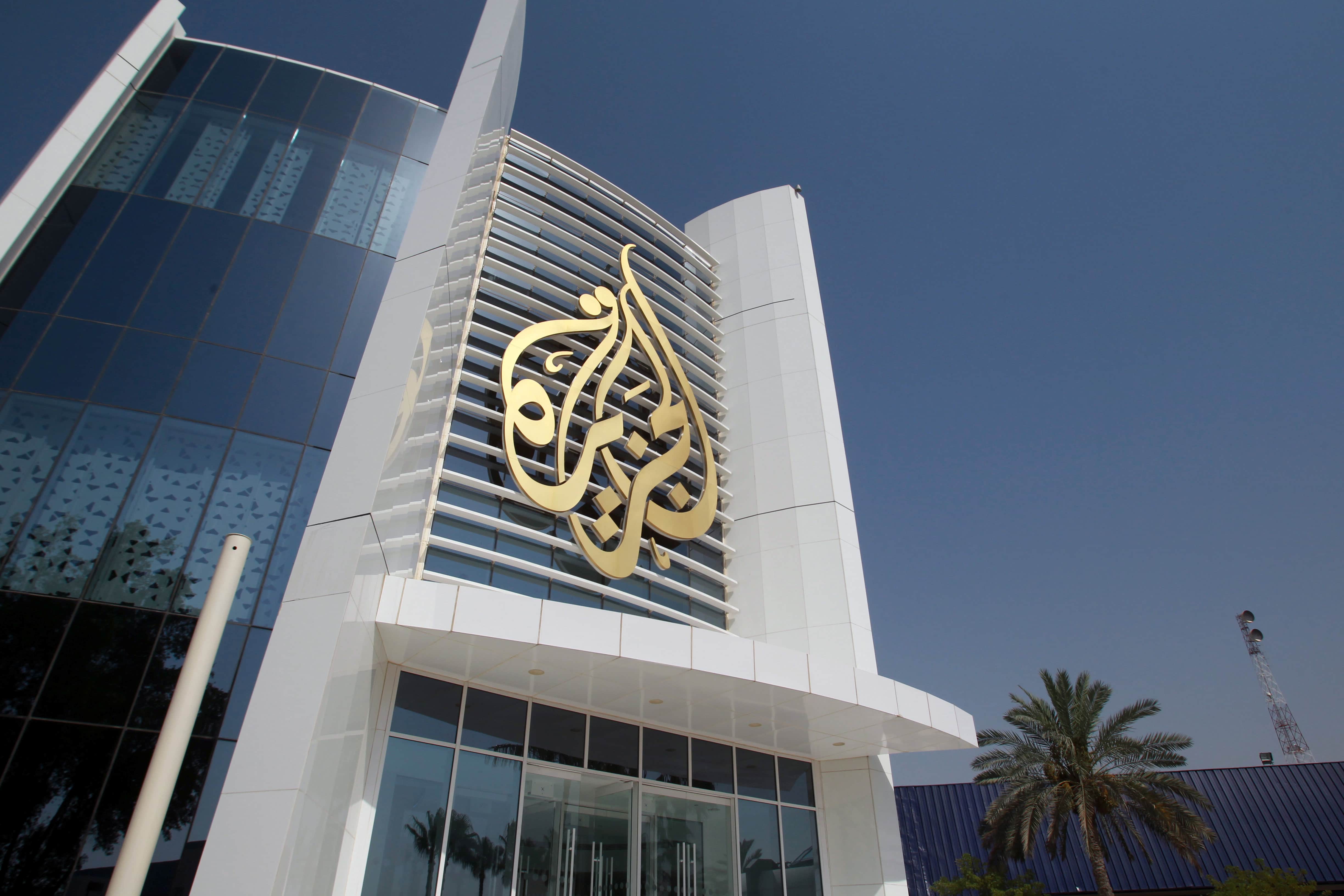 The Al Jazeera Media Network logo is seen on its headquarters building in Doha, Qatar, 8 June 2017, REUTERS/Naseem Zeitoon