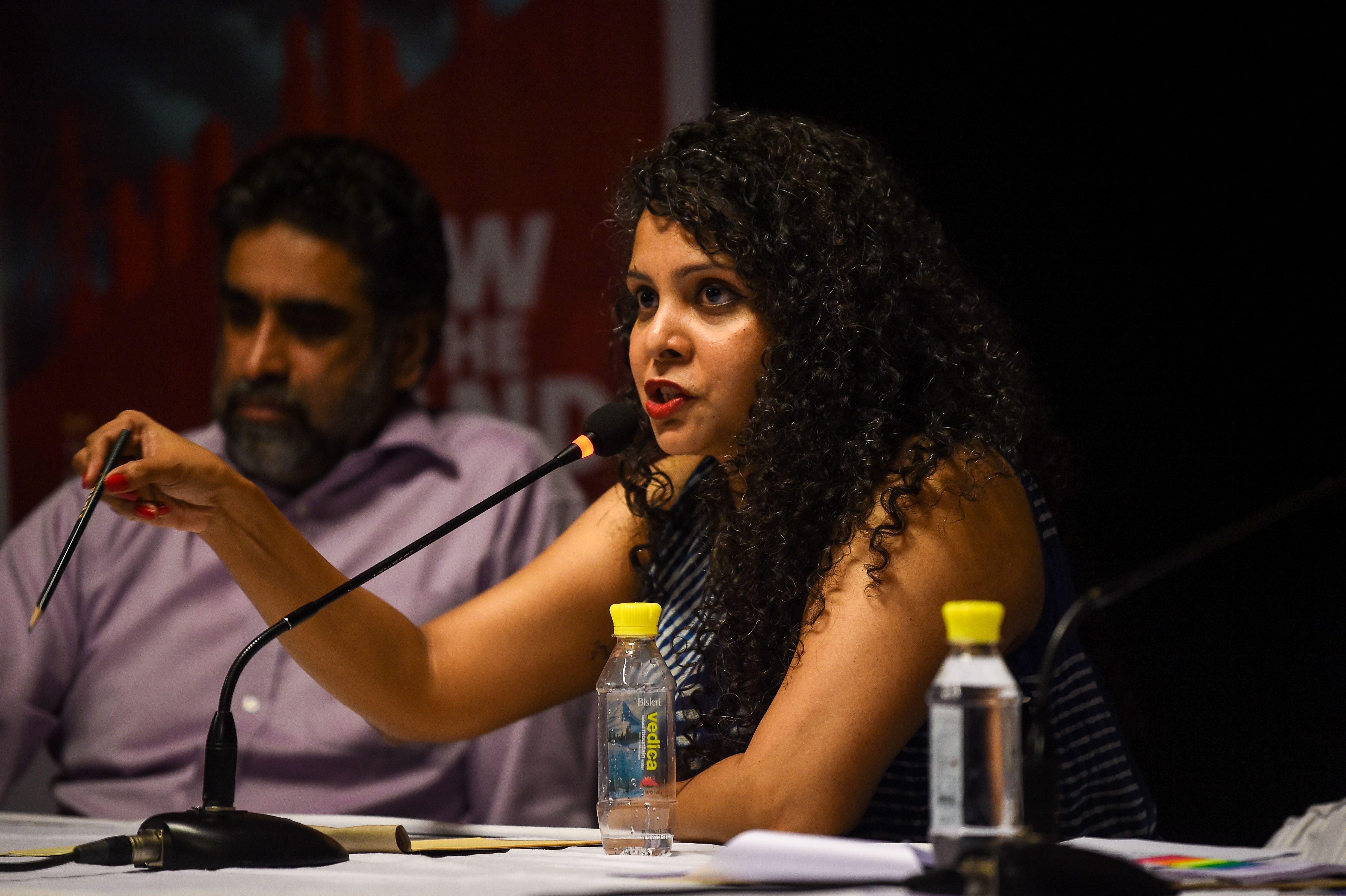 In this photograph taken on May 27, 2016, Indian journalist and author, Rana Ayyub speaks during the launch of her self published book 'Gujarat Files' in New Delhi, CHANDAN KHANNA/AFP/Getty Images