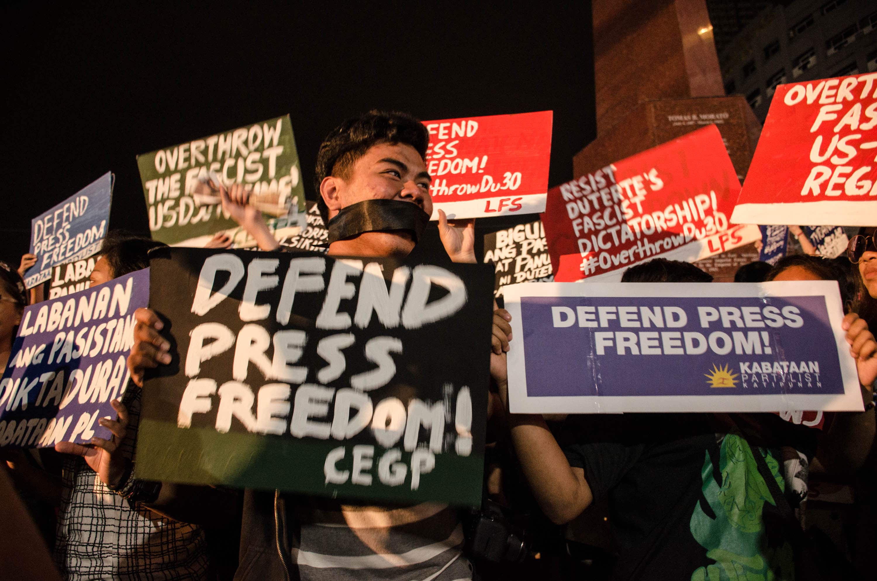 Activists join journalists in a protest against the Security and Commission's move to revoke Rappler's license, Bernice Beltran/NurPhoto via Getty Images