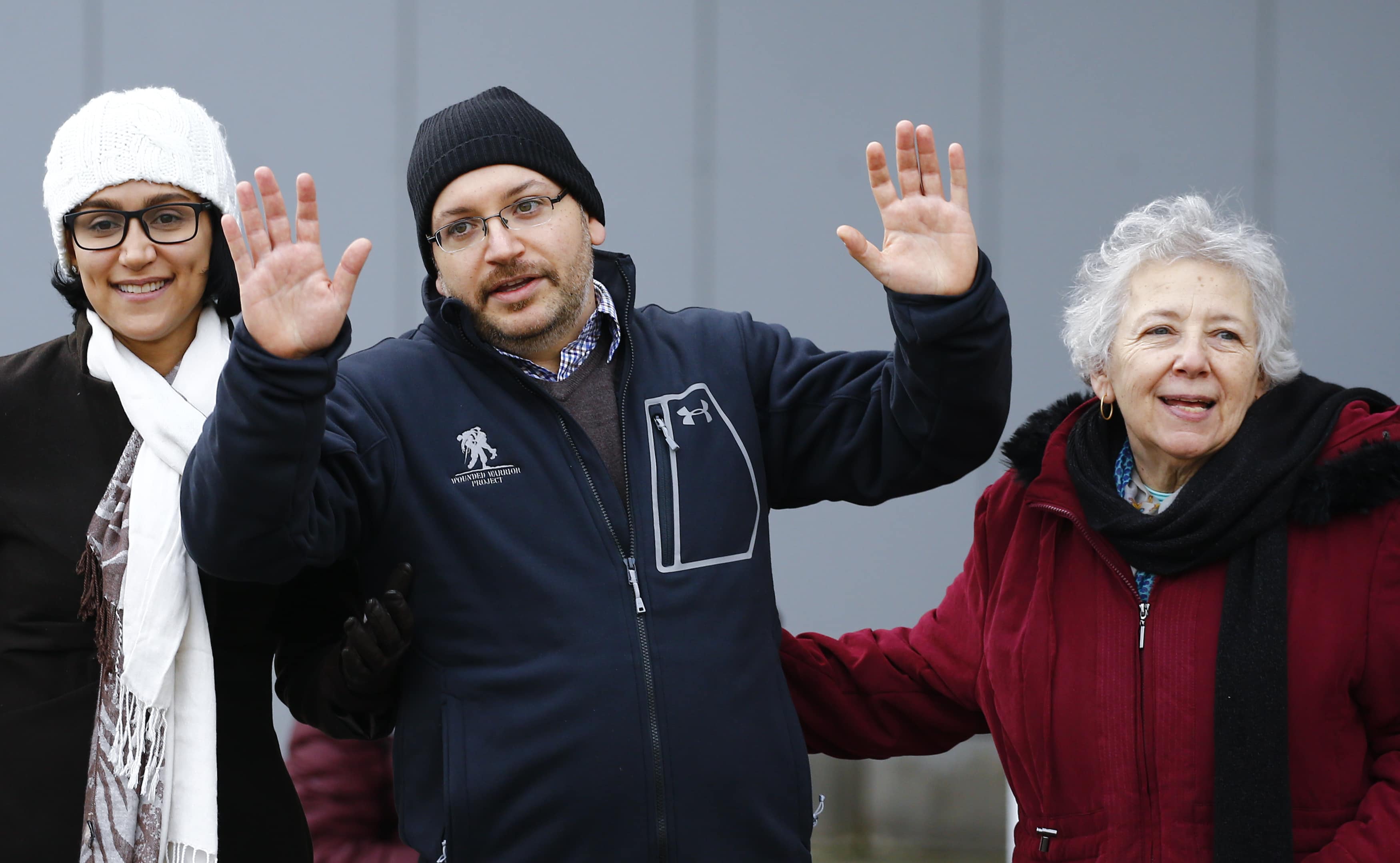 Jason Rezaian (C) waves to media as he stands with his wife Yeganeh Salehi (L) and mother Mary Rezaian in the southwestern town of Landstuhl, Germany, January 20, 2016. , REUTERS/Kai Pfaffenbach