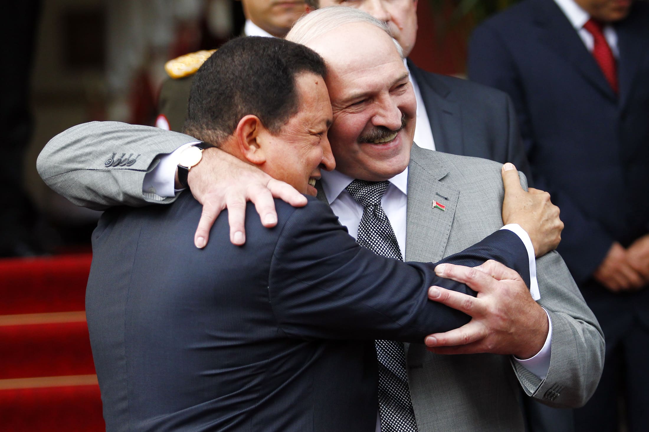 Venezuela's President Hugo Chavez (L) and his Belarussian counterpart Alexander Lukashenko embrace at Miraflores Palace in Caracas on 26 June 2012, REUTERS/Carlos Garcia Rawlins