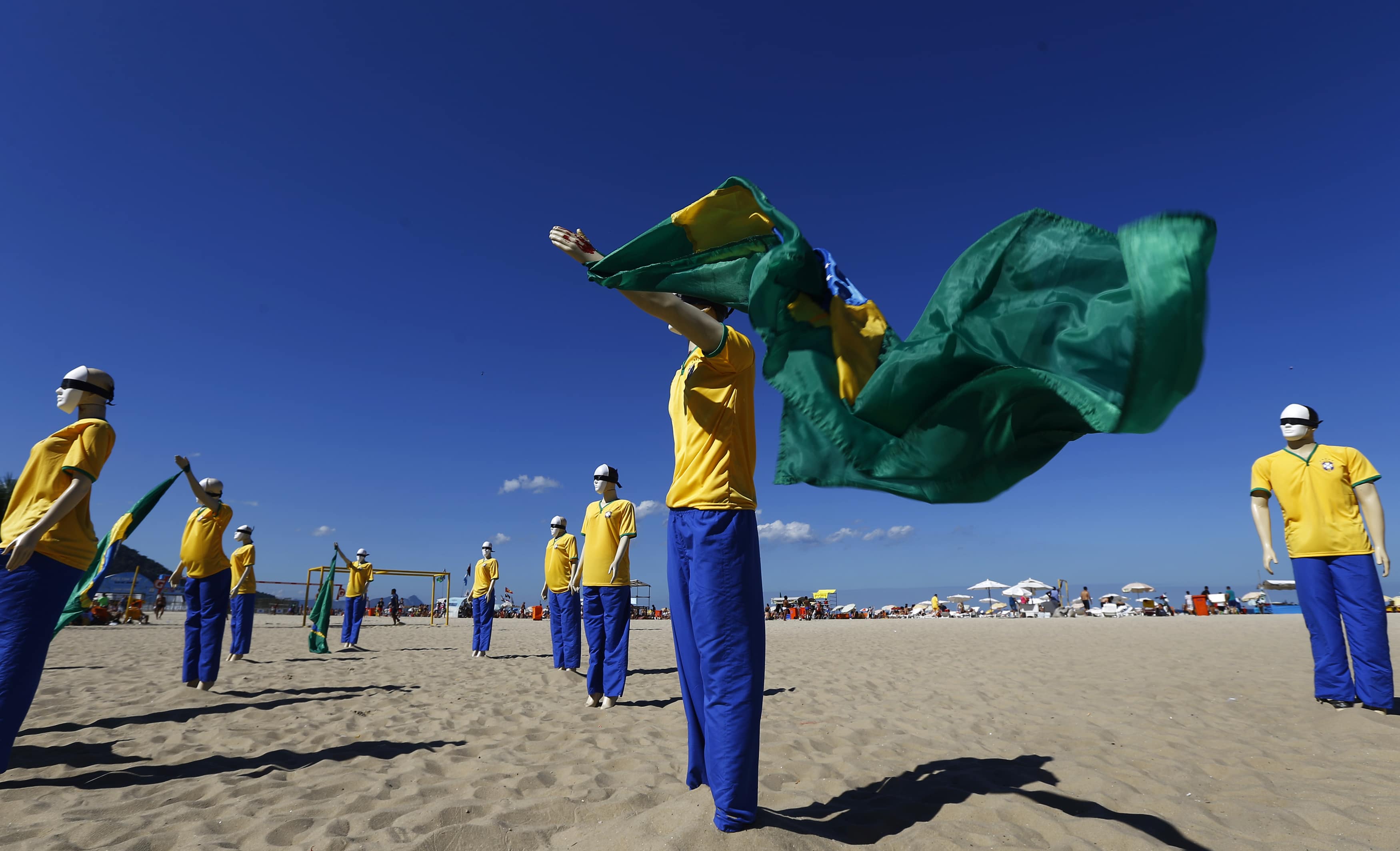 Mannequins placed by protesters are pictured during a protest against the 2014 World Cup run by the NGO Rio de Paz in Rio de Janeiro on 6 July 2014, REUTERS/Ricardo Moraes