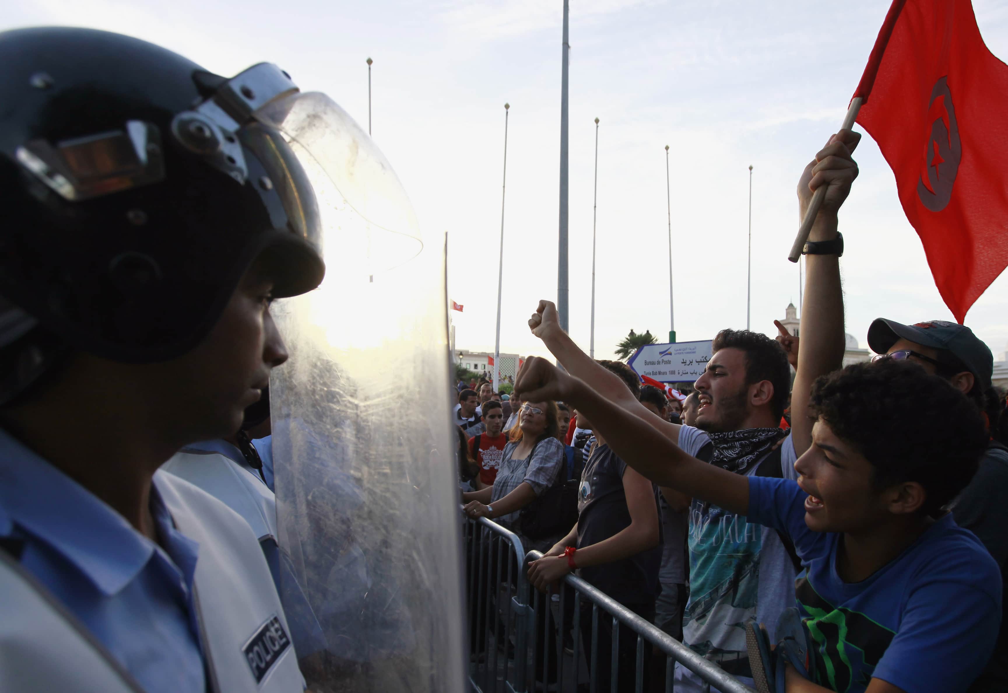 Protesters shout slogans during a demonstration to call for the departure of the Islamist-led ruling coalition, in Tunis on 23 October 2013, REUTERS/Anis Mil