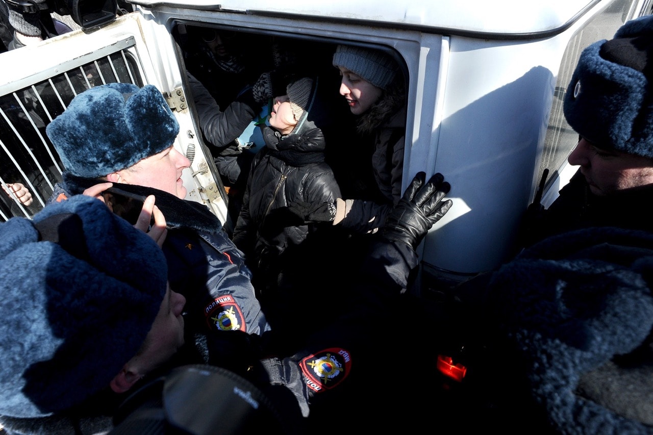 Anti-fascist activists are arrested by police after holding a protest near the venue of the International Russian Conservative Forum in St. Petersburg, 22 March 2015, OLGA MALTSEVA/AFP/Getty Images