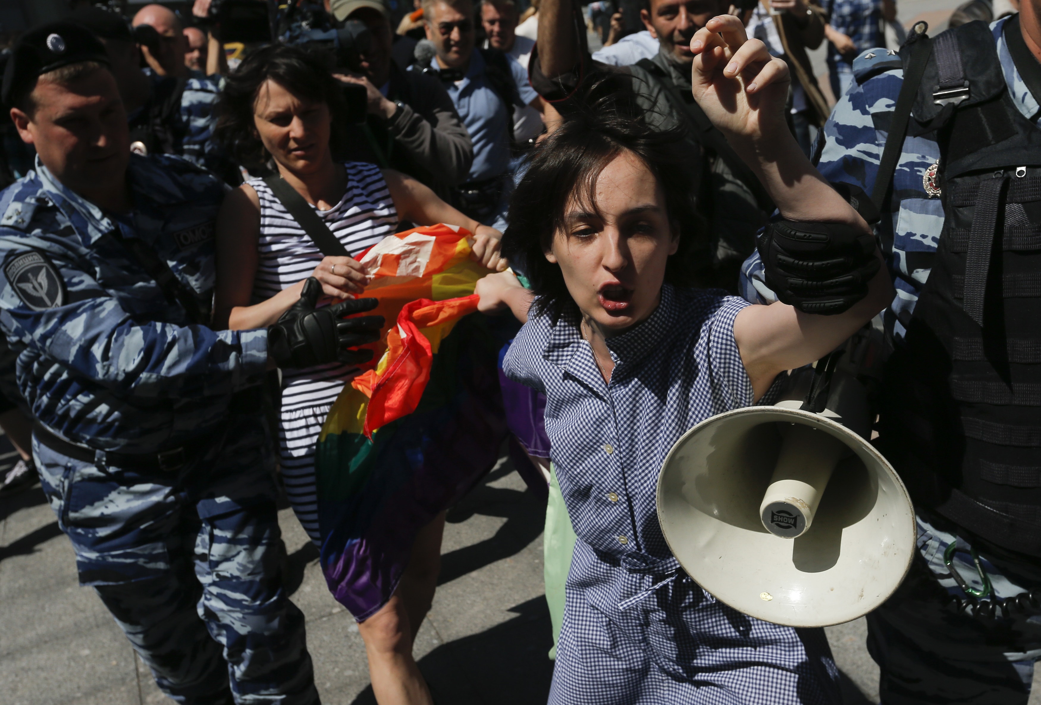 Gay rights activists are detained by police during a protest in Moscow, 31 May 2014, REUTERS/Maxim Shemetov