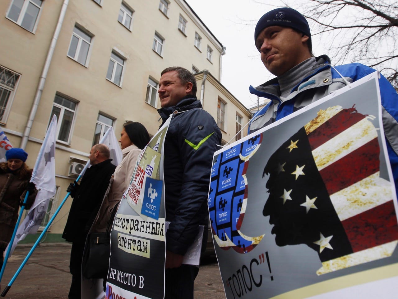 Activists stand outside the office of non-governmental body Golos, during a protest against the organisation's foreign relations in Moscow, 5 April 2013, REUTERS/Maxim Shemetov