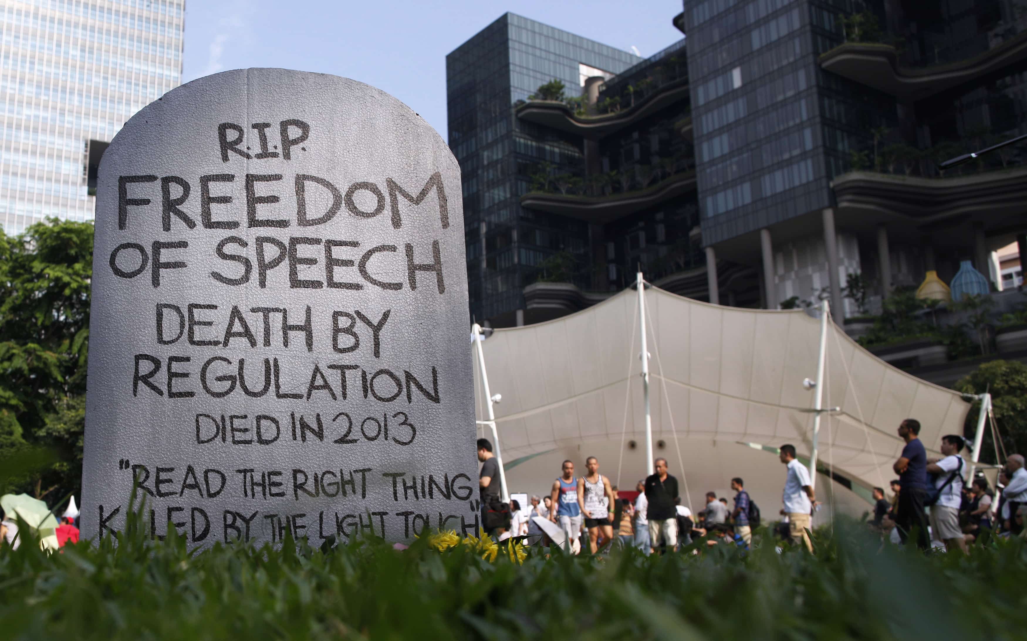 A mock gravestone featured in a protest against licensing regulations for online news sites, at Hong Lim Park in Singapore, 8 June 2013, REUTERS/Edgar Su