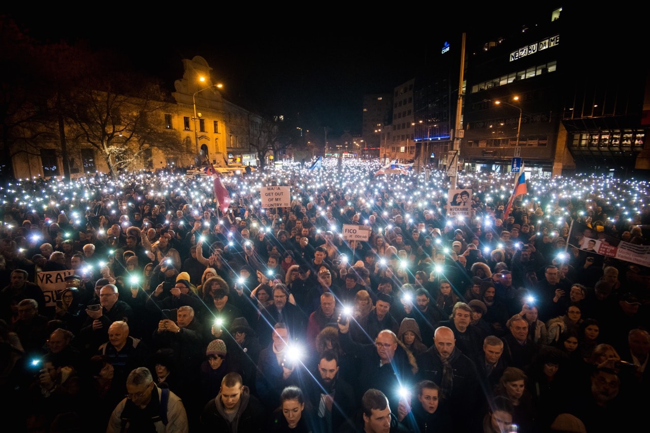 People attend a protest named 'For a Decent Slovakia' on the first anniversary of the murder of journalist Jan Kuciak and his fiancee Martina Kusnirova, in Bratislava, 21 February 2019, VLADIMIR SIMICEK/AFP/Getty Images