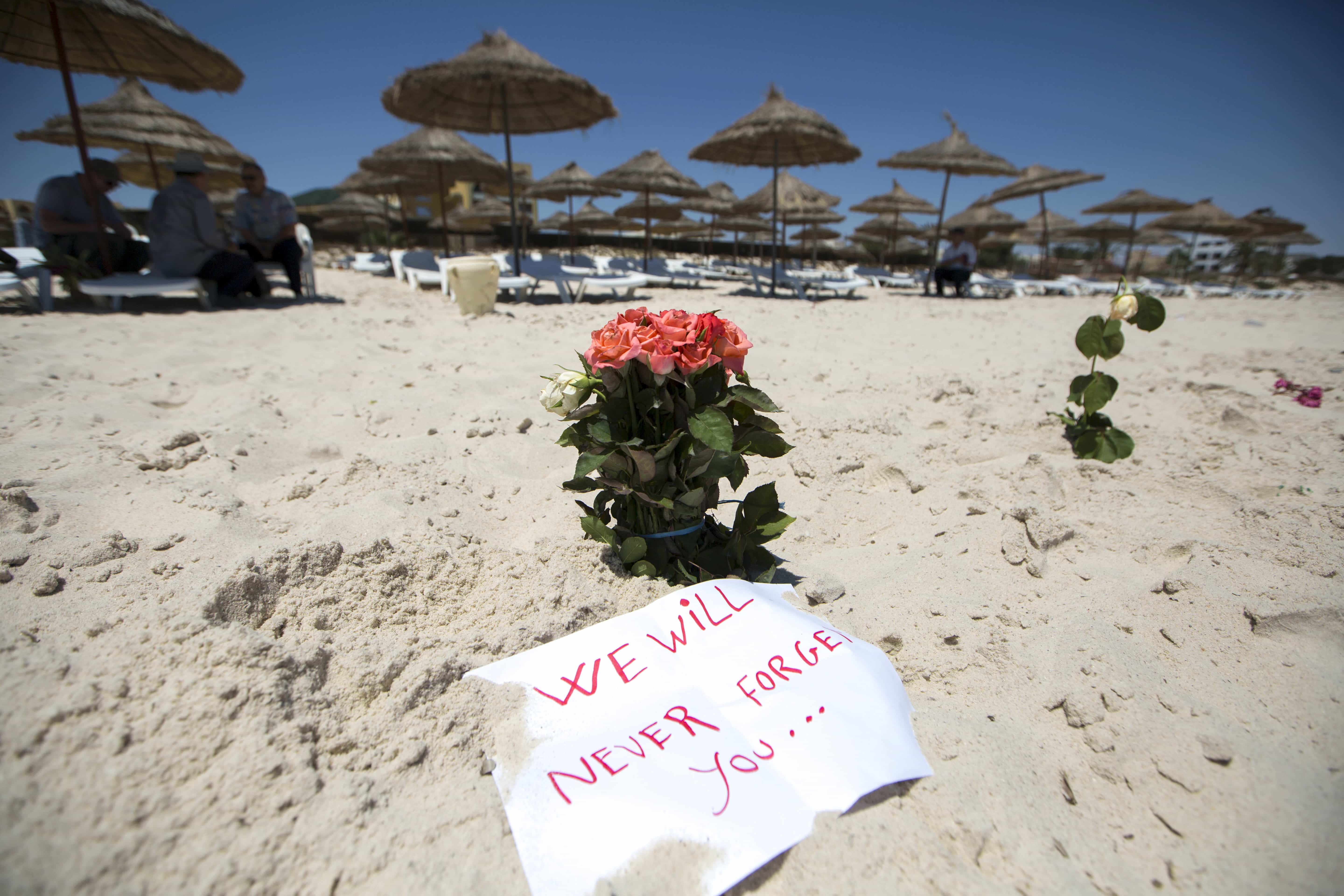 Flowers are laid at the beachside of the Imperial Marhaba resort, which was attacked by a gunman in Sousse, Tunisia, June 28, 2015, REUTERS/Zohra Bensemra