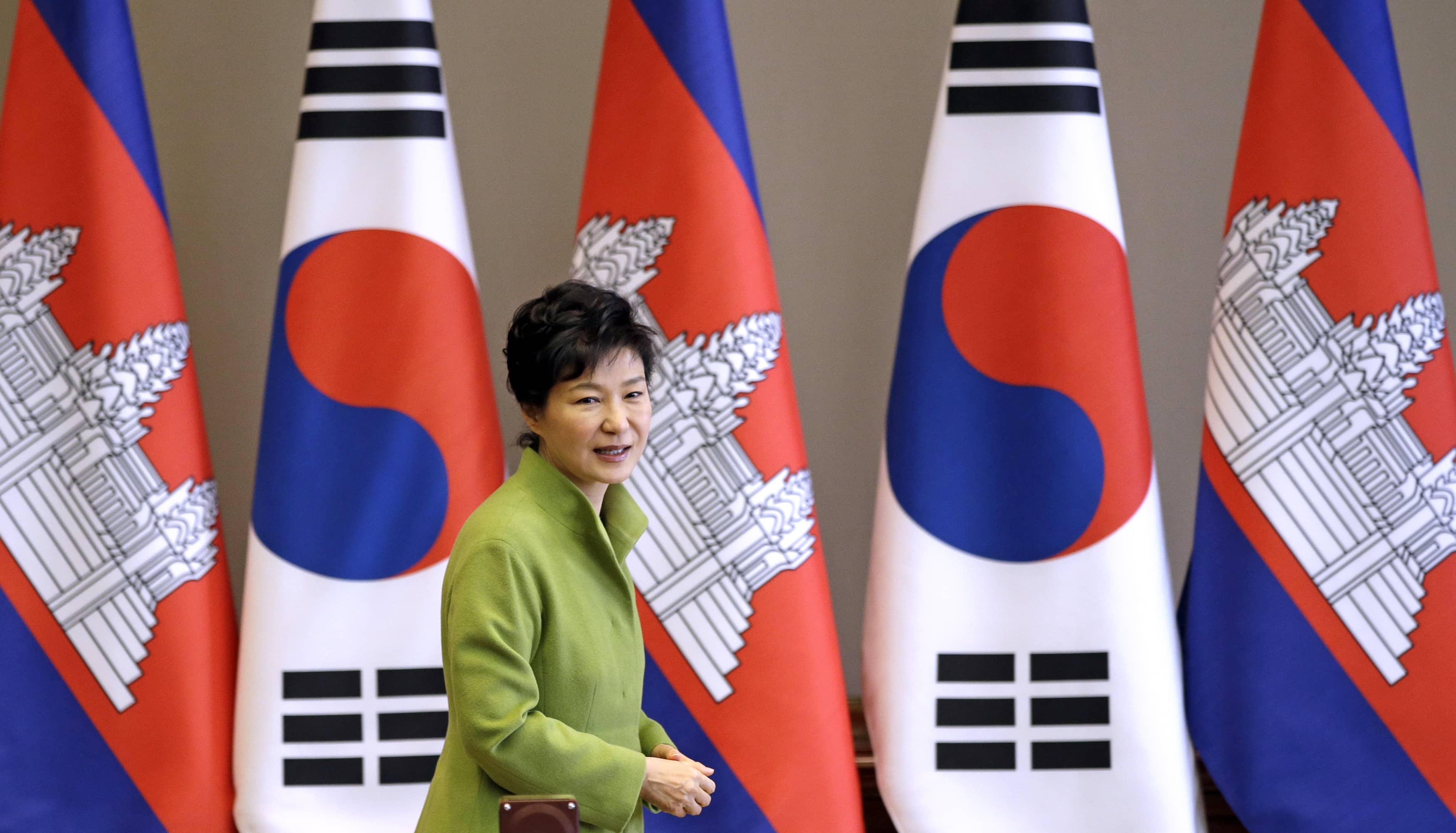 eight aides of President Park Geun-hye (pictured on 13 December 2014) filed a criminal defamation complaint against six reporters and staff members working at the newspaper "Segye Ilbo", REUTERS/Lee Jin-man/Pool