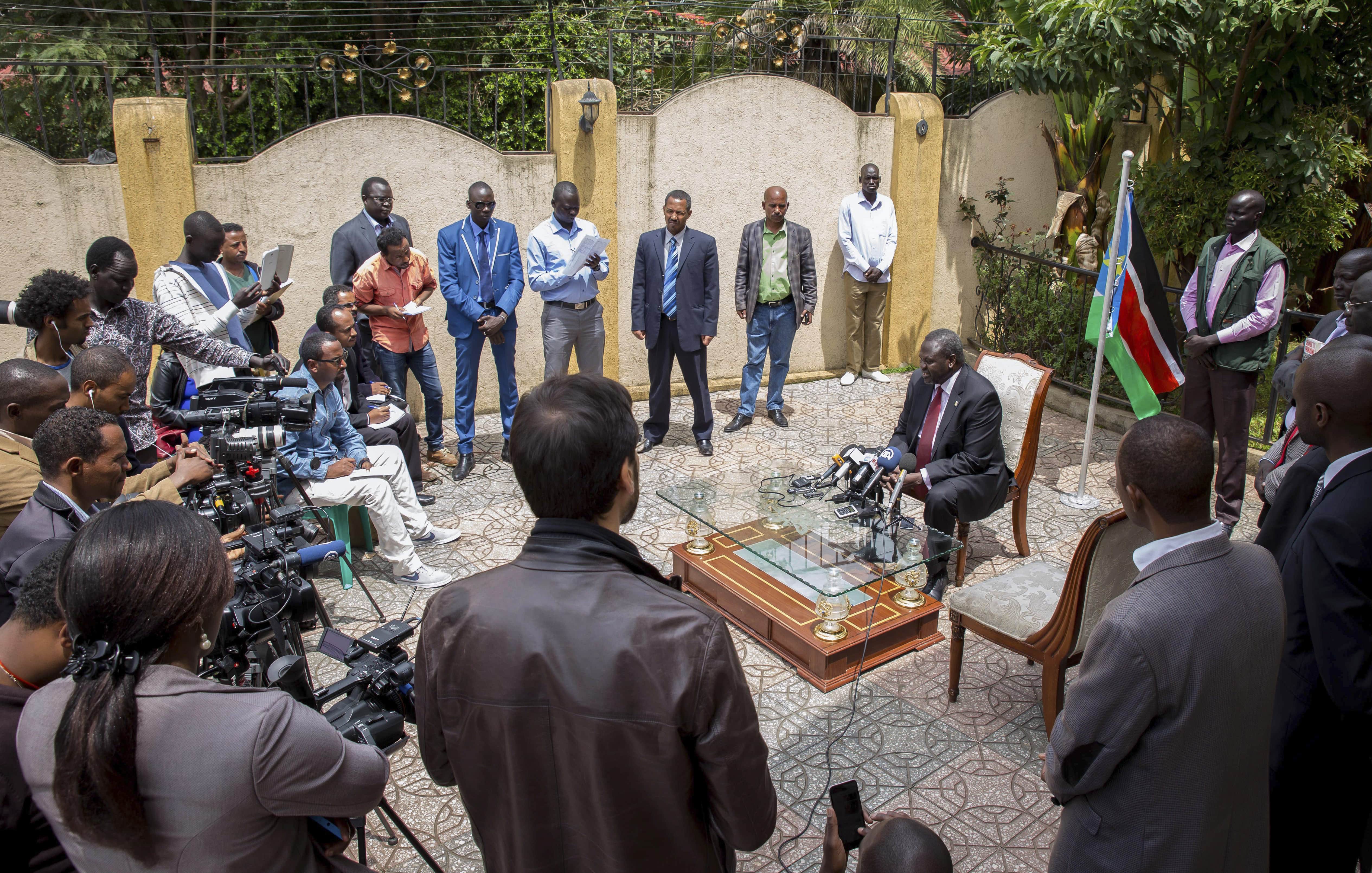 South Sudan's rebel leader Riek Machar speaks to the media about the situation in South Sudan following a peace agreement with the government, in Addis Ababa, Ethiopia, 31 August 2015, AP Photo/Mulugeta Ayene