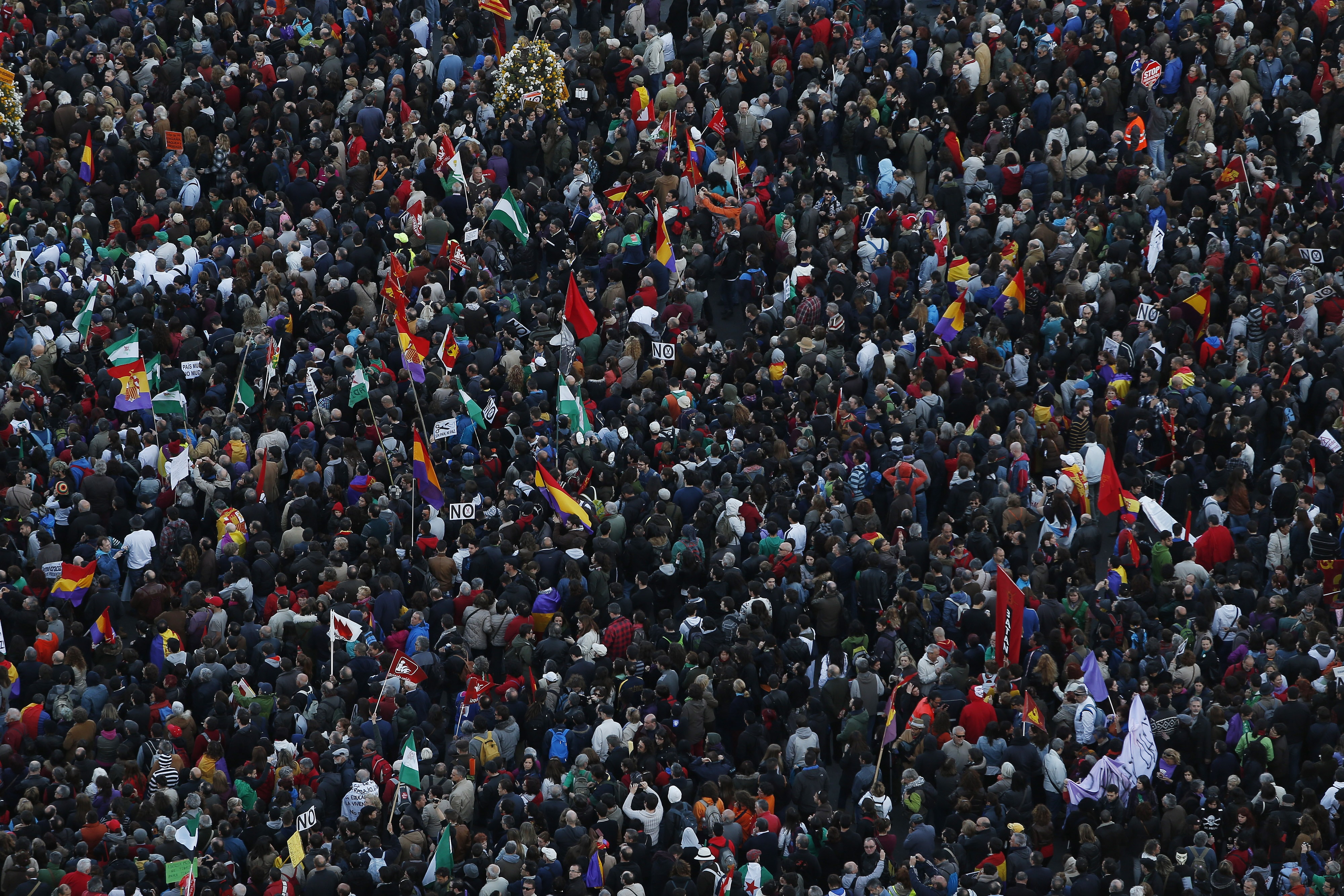 People gather during a protest against the Government in Madrid, Spain, Saturday, March 22, 2014., AP Photo/Andres Kudacki