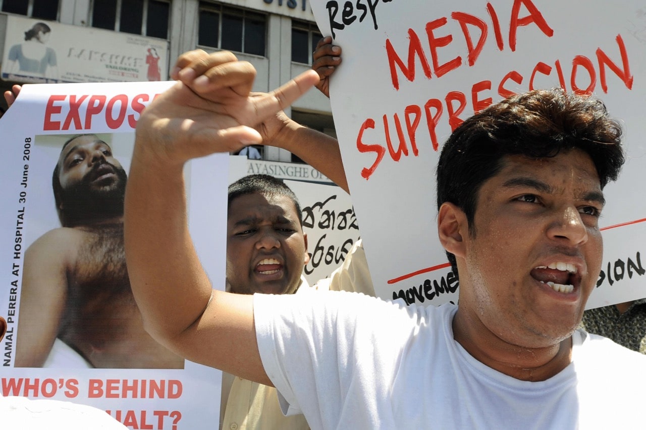 Sri Lankan media rights activists hold a protest rally in Colombo on 2 July 2008, following an attack on a British embassy political officer and independent writer Namal Perera, Ishara S. KODIKARA/AFP/Getty Images