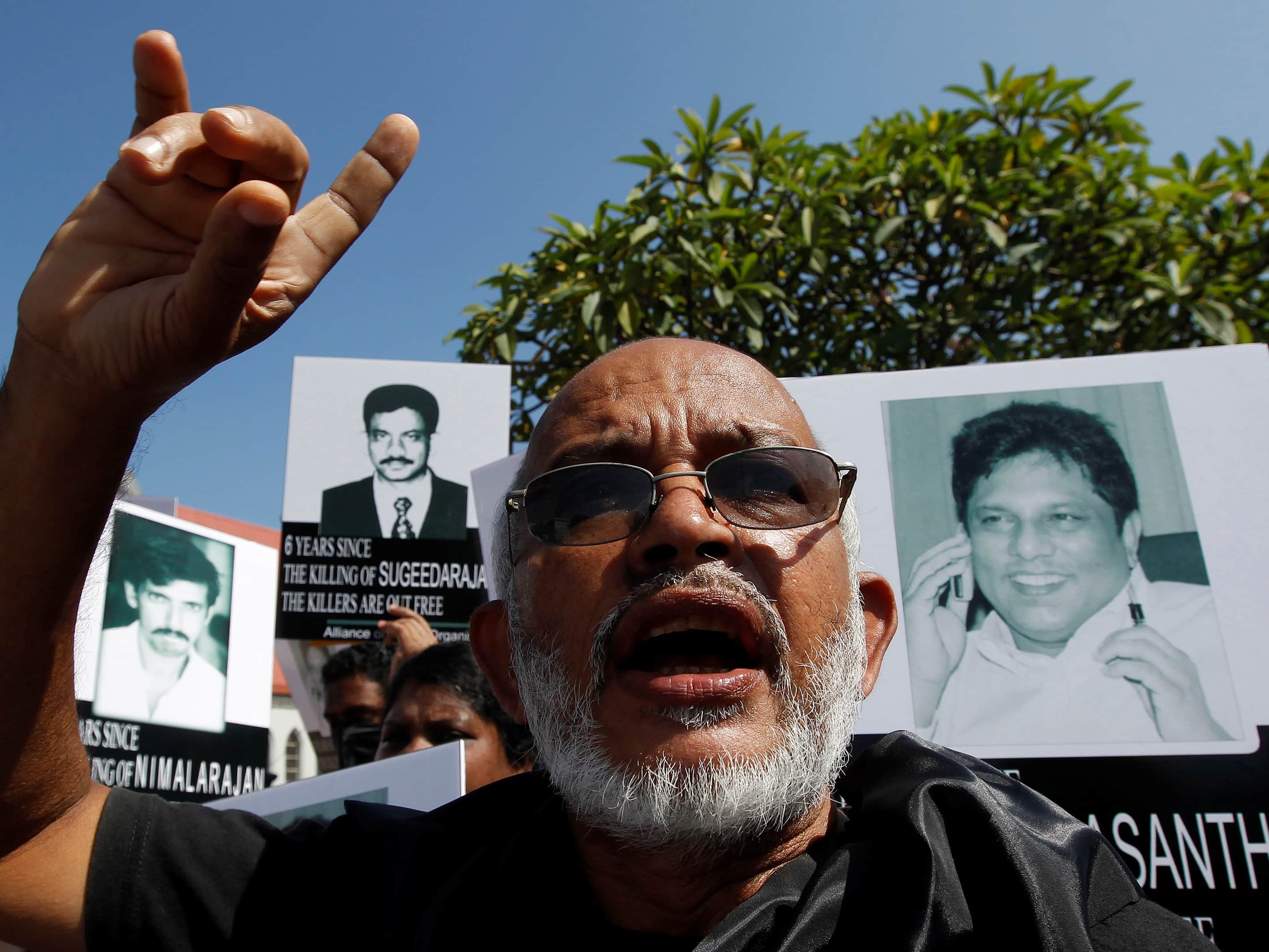 Posters depicting editor Lasantha Wickramatunga and other killed journalists are displayed during a protest in Colombo by the Alliance of Media Organization, 29 January 2013, REUTERS/Dinuka Liyanawatte