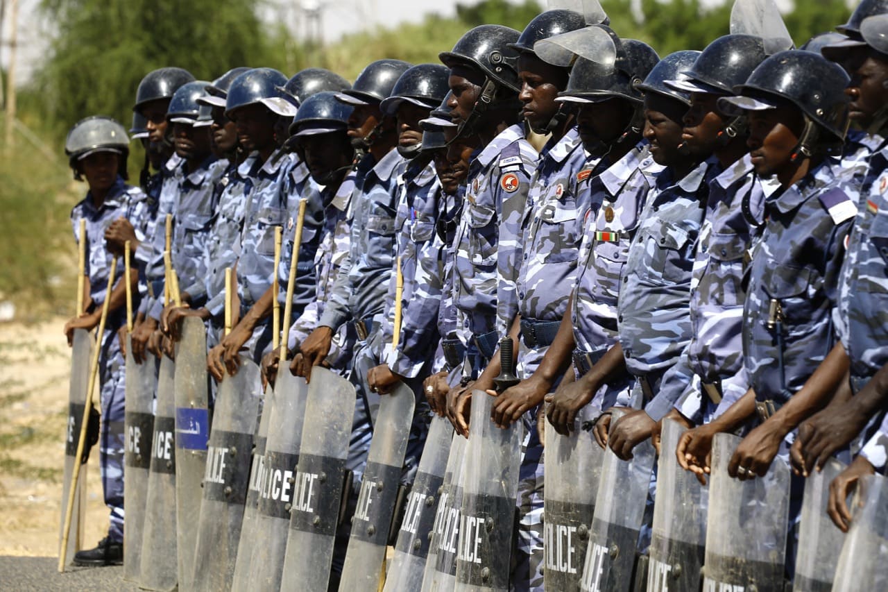 Sudanese police stand guard outside the US embassy during a demonstration in the capital Khartoum, 3 November 2015, ASHRAF SHAZLY/AFP/Getty Images
