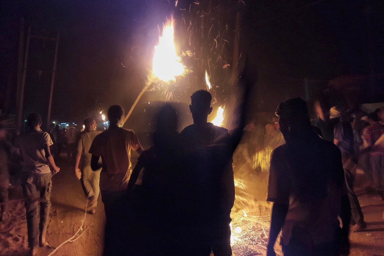 Sudanese demonstrators gather during an anti-government protest in the Haj Yousef neighbourhood, in Khartoum, 22 January 2019, STRINGER/AFP/Getty Images