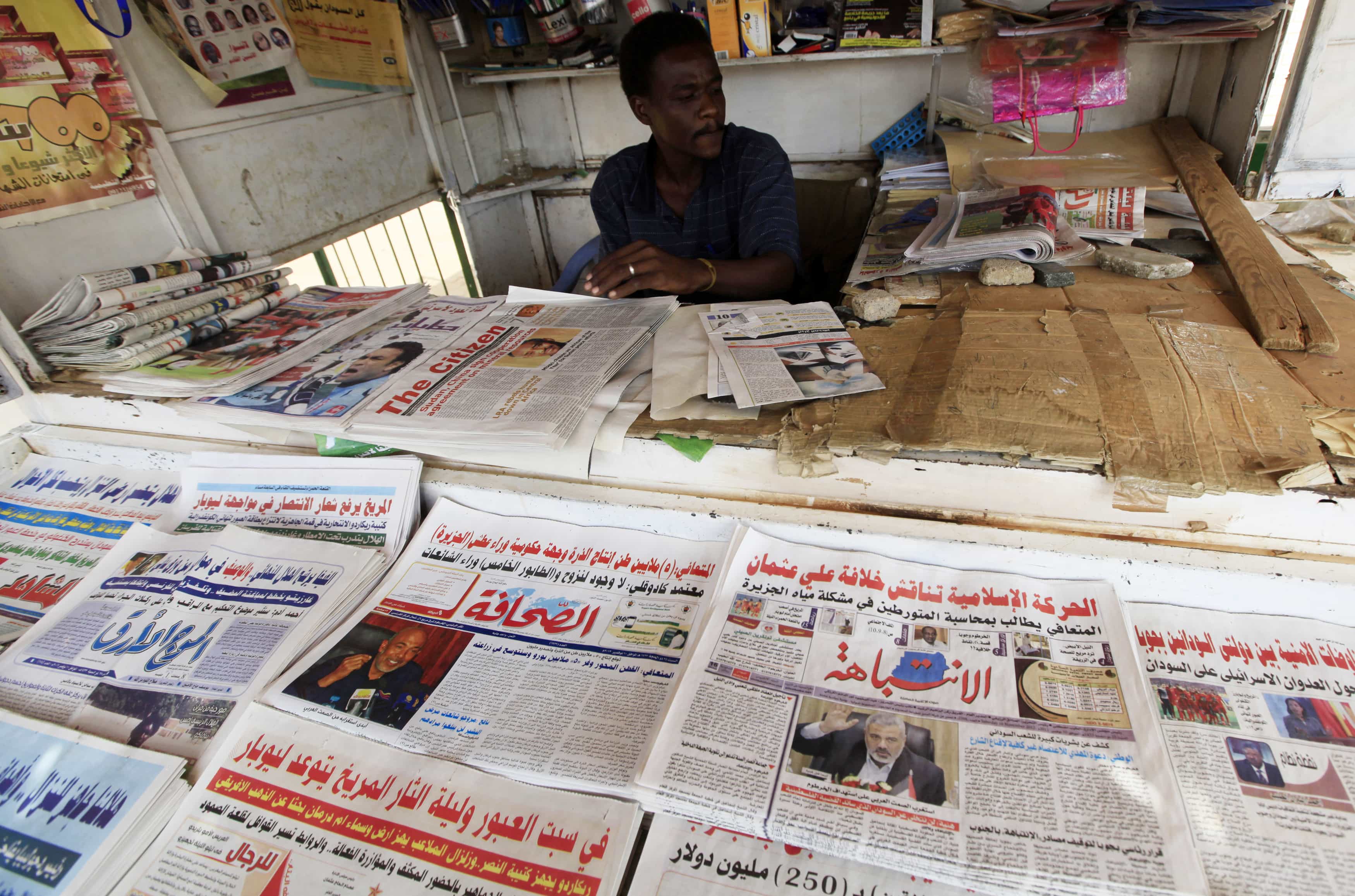 The al-Intibaha newspaper is seen on display with other newspaper titles at a newsstand in Khartoum, 10 November 2012., REUTERS/Mohamed Nureldin Abdallah