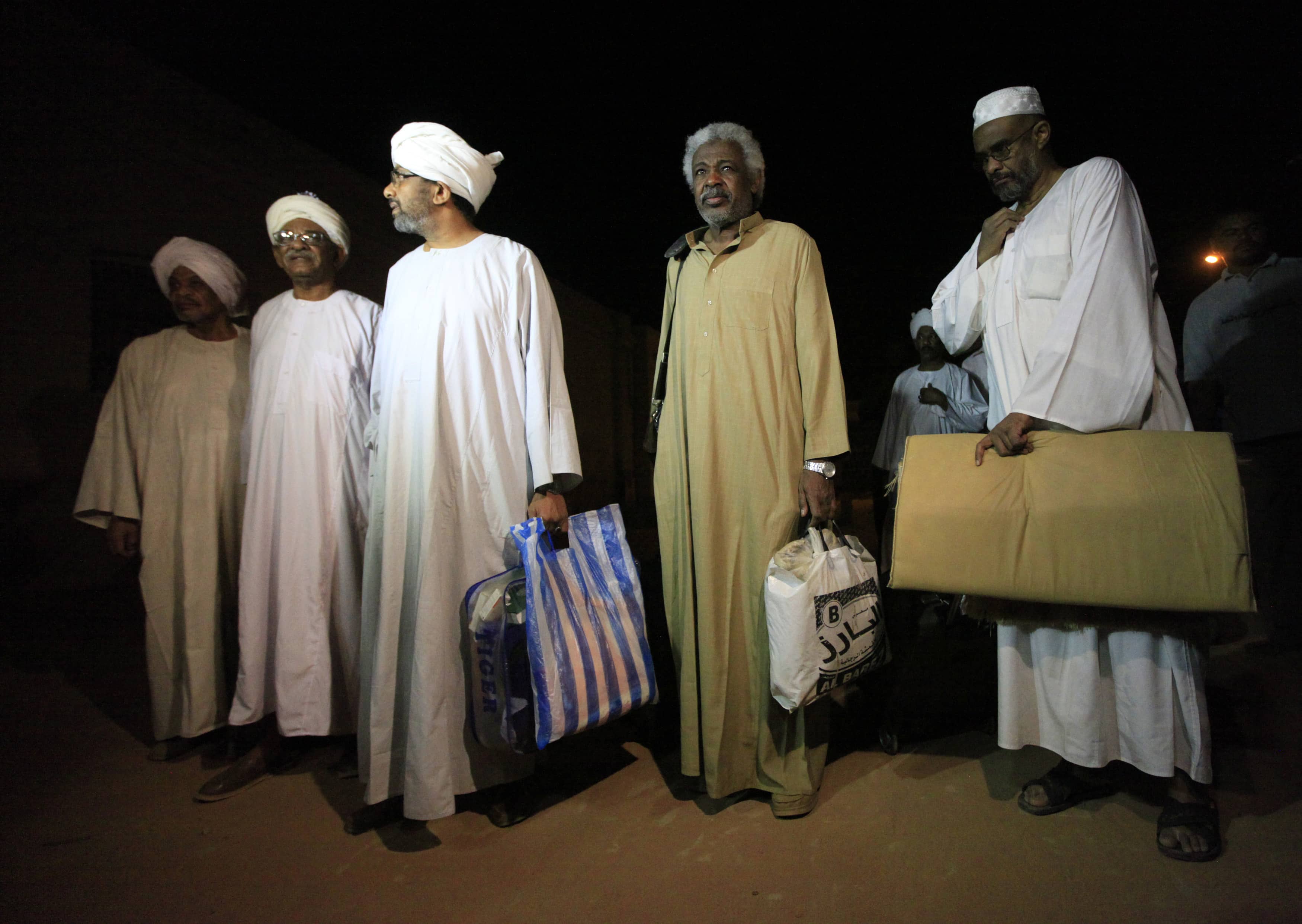 Political prisoners walk out after their release from Kober Prison in Khartoum, 2 April 2013., REUTERS/Mohamed Nureldin Abdallah