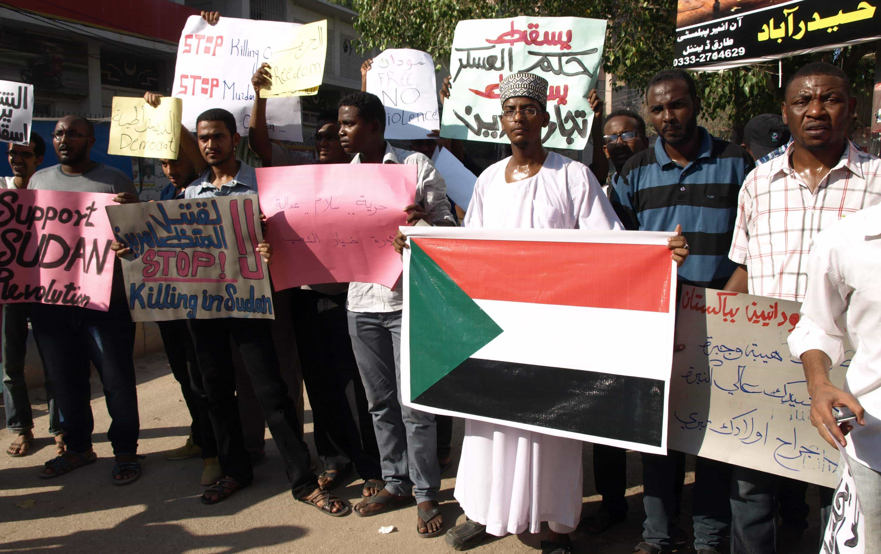 Sudanese students from universities in Pakistan protest outside a press club to condemn the violence in Sudan, September 2013., Adeel Ahmed/Demotix