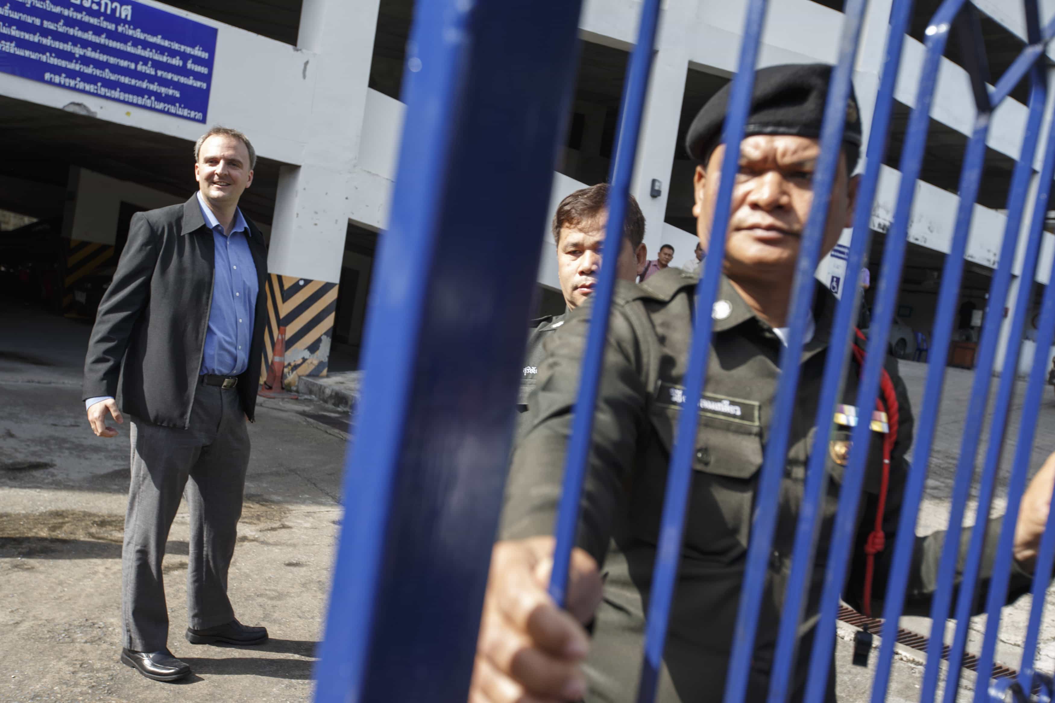 British rights activist Andy Hall (L) arrives at the Phra Khanong Provincial Court in Bangkok, 29 October 2014, REUTERS/Athit Perawongmetha