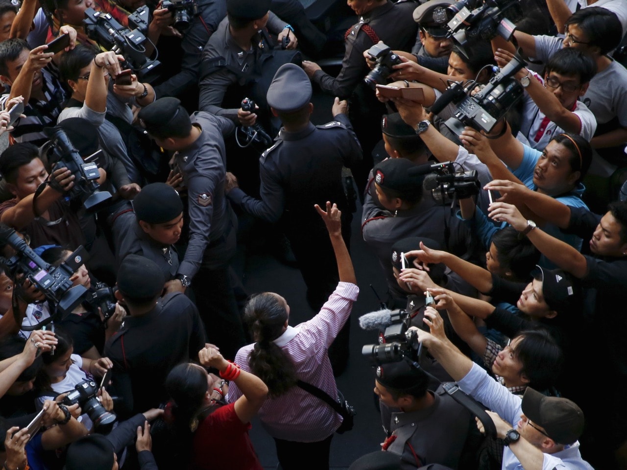 Members of the media covering the arrest of student activists in Bangkok, 27 April 2016 , REUTERS/Jorge Silva