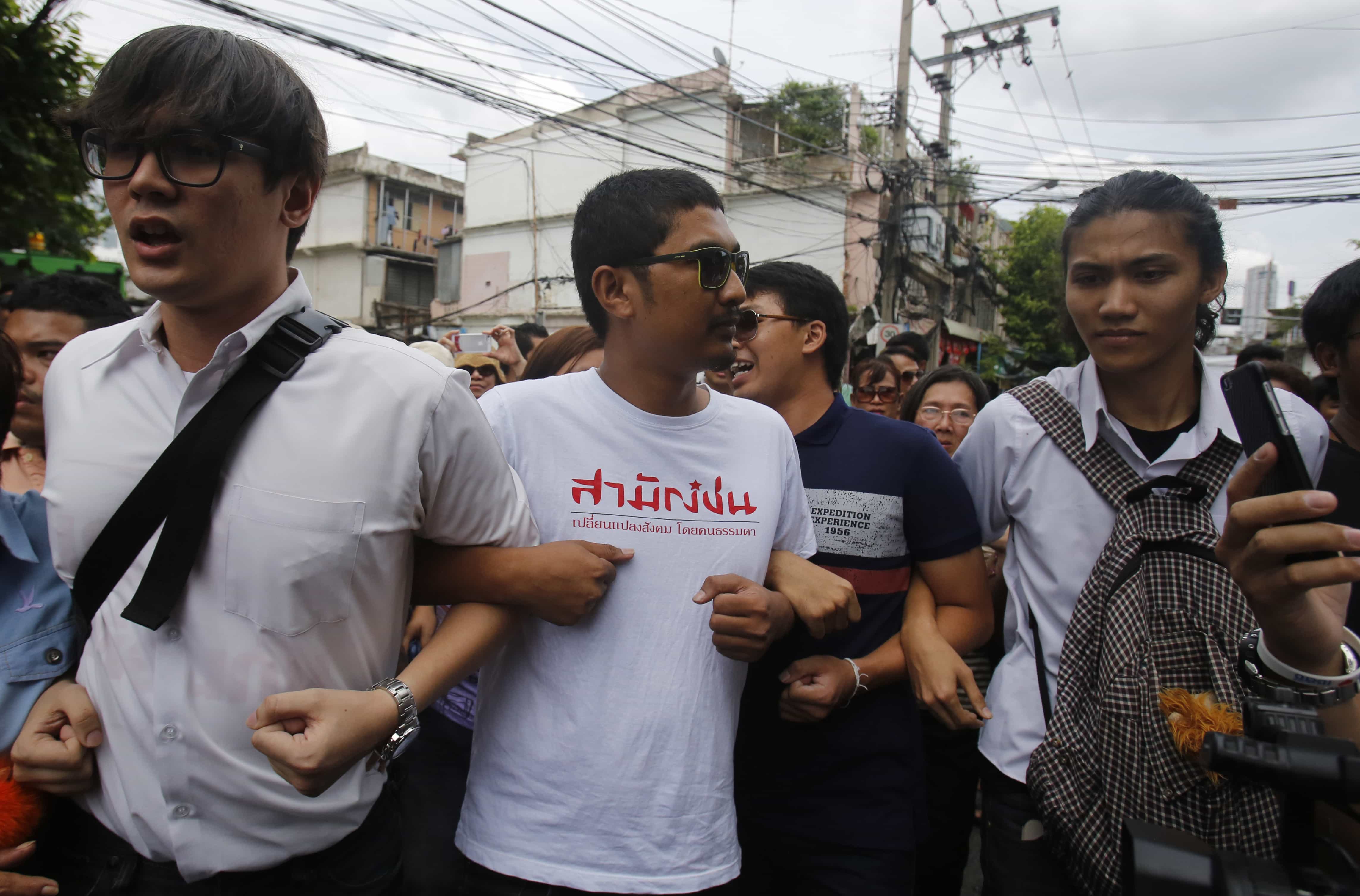 Student activists gather outside Pathumwan Police Station in Bangkok, Thailand, on 24 June 2015, AP Photo/Sakchai Lalit