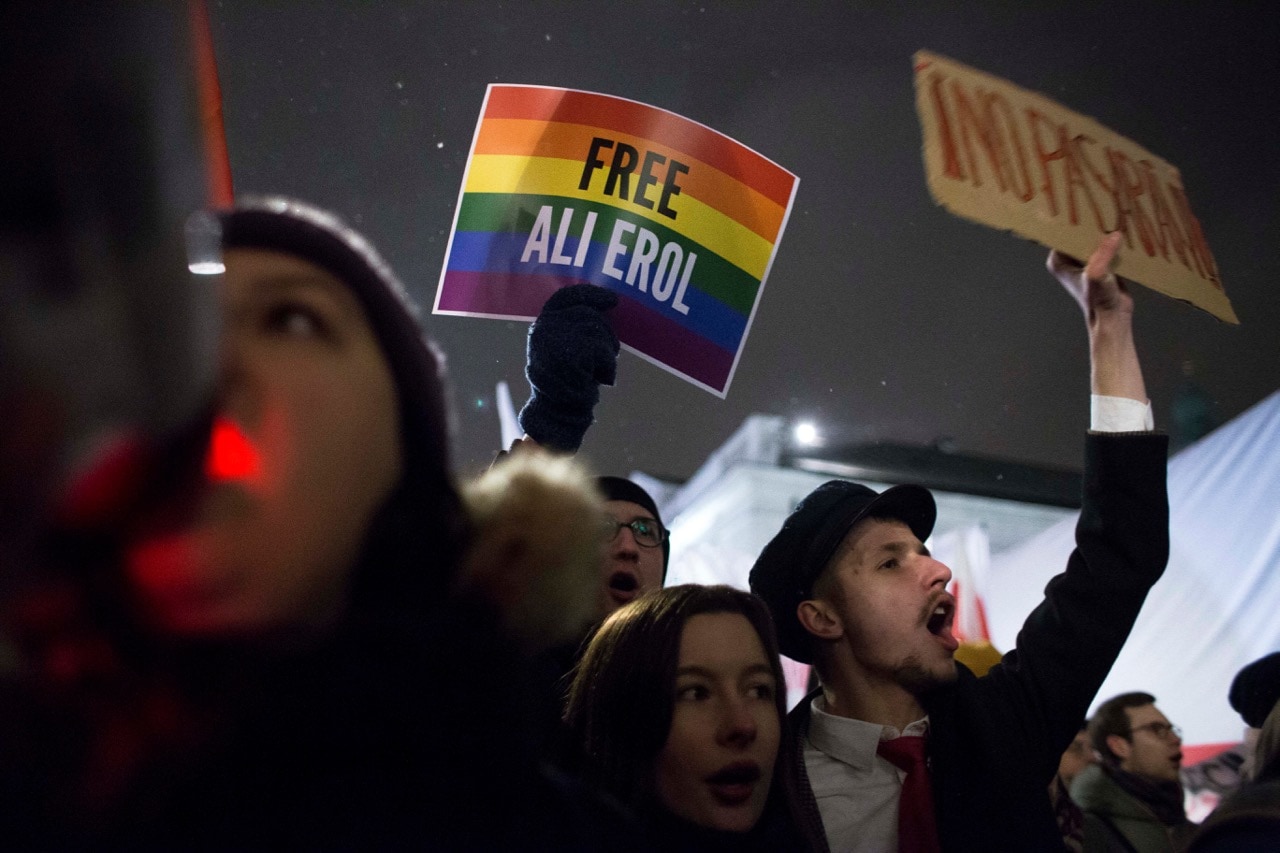 A sign calling for the release of activist Ali Erol is displayed during a protest held to counteract a far-right protest, in Warsaw, Poland, 5 February 2018, Maciej Luczniewski/NurPhoto via Getty Images