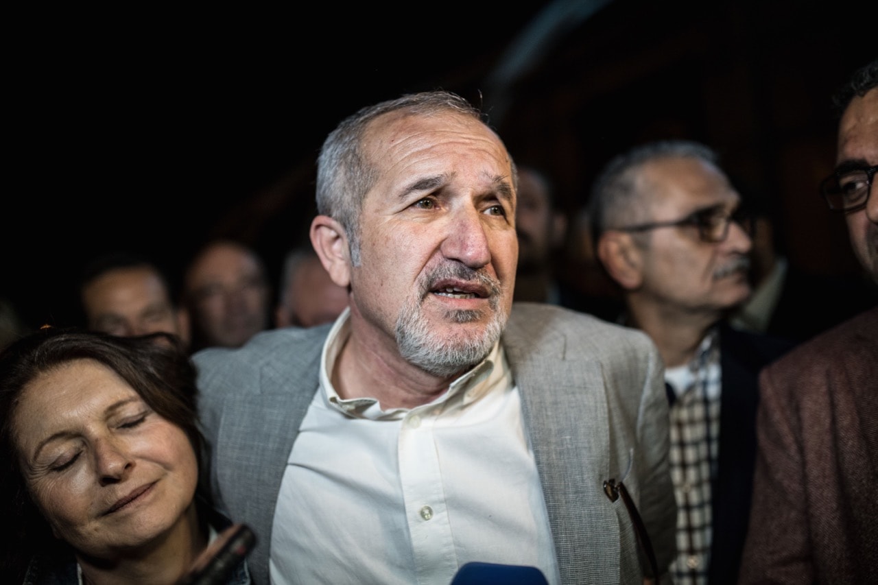 "Cumhuriyet" chairman Akin Atalay (R) and his wife Adalet Atalay (L) speak to journalists after he was released from Silivri prison, in Silivri, outside of Istanbul, Turkey, 25 April 2018, BULENT KILIC/AFP/Getty Images