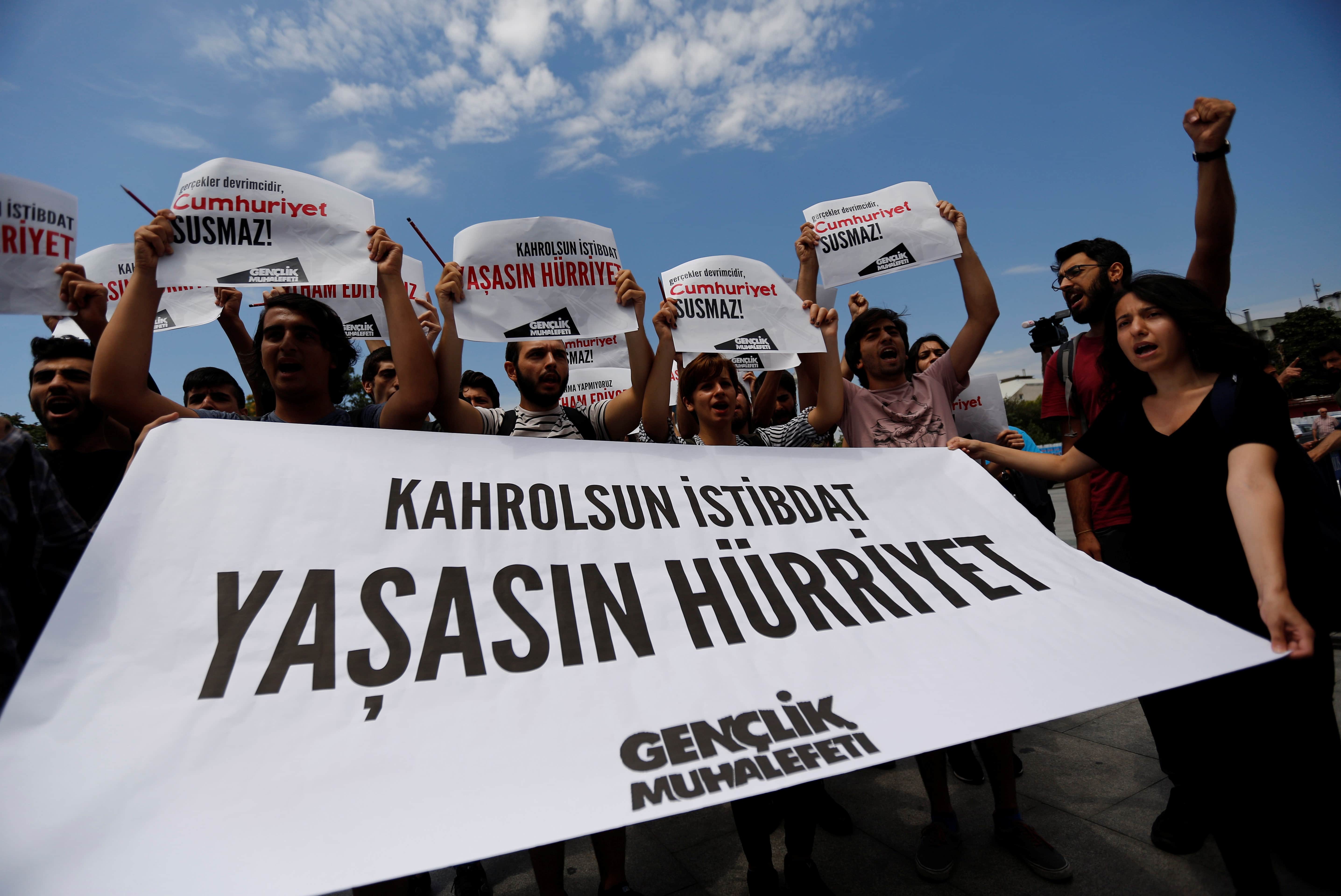 Press freedom activists hold a demonstration in solidarity with the jailed members of "Cumhuriyet" outside a courthouse, in Istanbul, Turkey, 28 July 2017. The banner reads: "To hell with despotism. Long live freedom", REUTERS/Murad Sezer