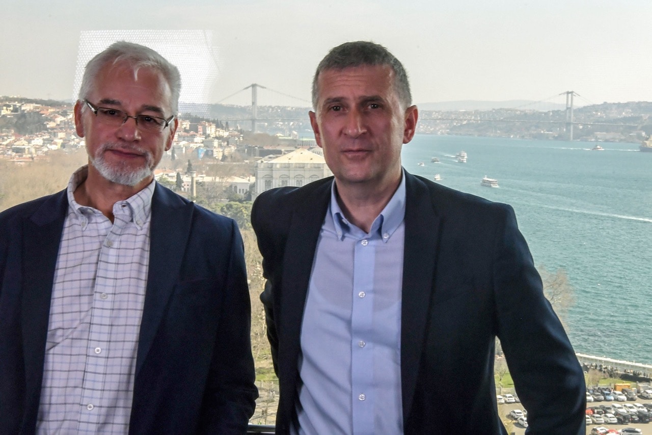 Istanbul bureau chief for ZDF Jörg Brase (R) and "Tagespiegel" correspondent Thomas Seibert pose with the Bosphorus Strait in the background after a press conference at ZDF's Istanbul headquarters, 10 March 2019, OZAN KOSE/AFP/Getty Images