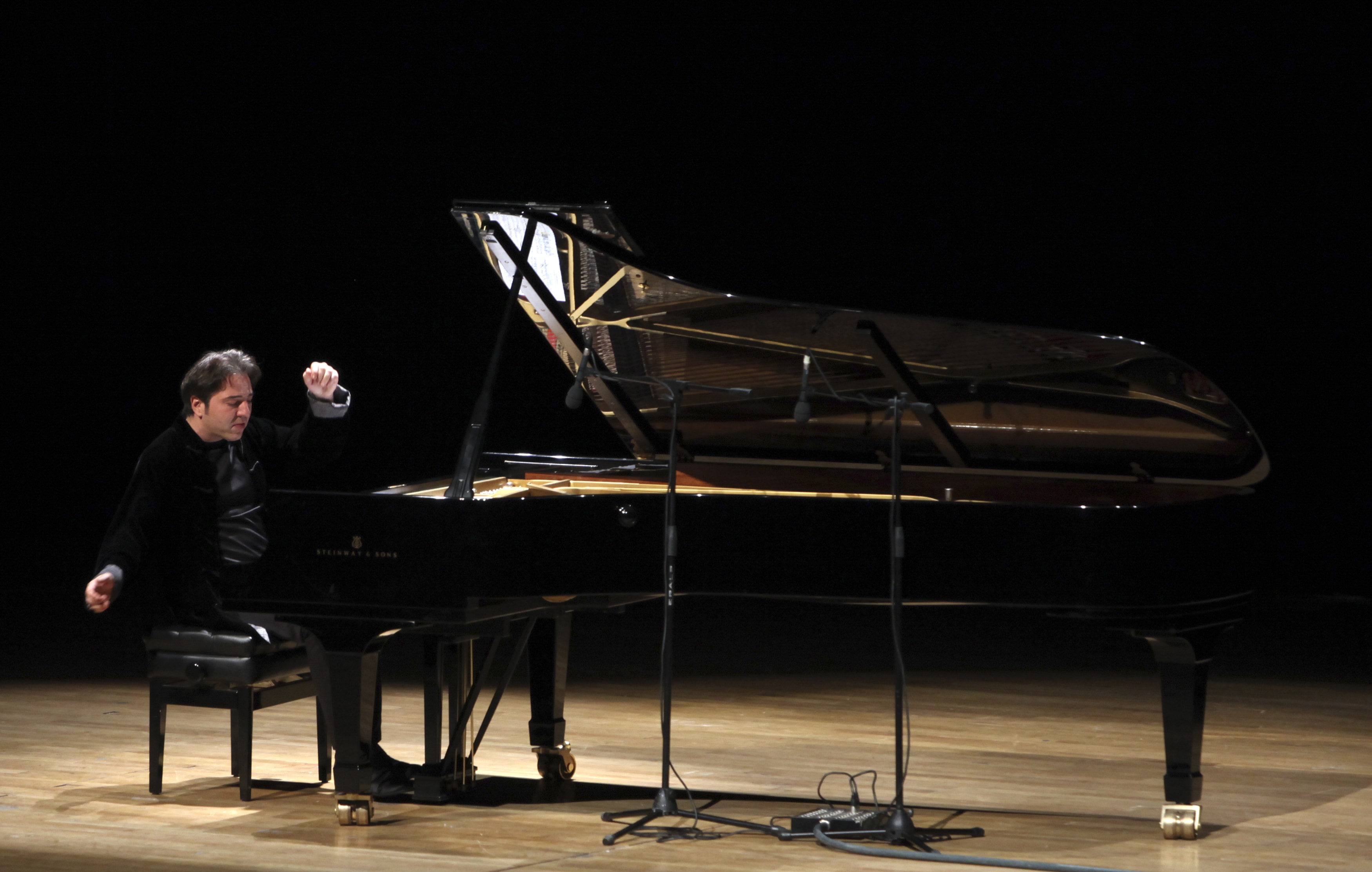 Turkish classical pianist Fazil Say performs during a concert in Ankara, 14 October 2010., Reuters