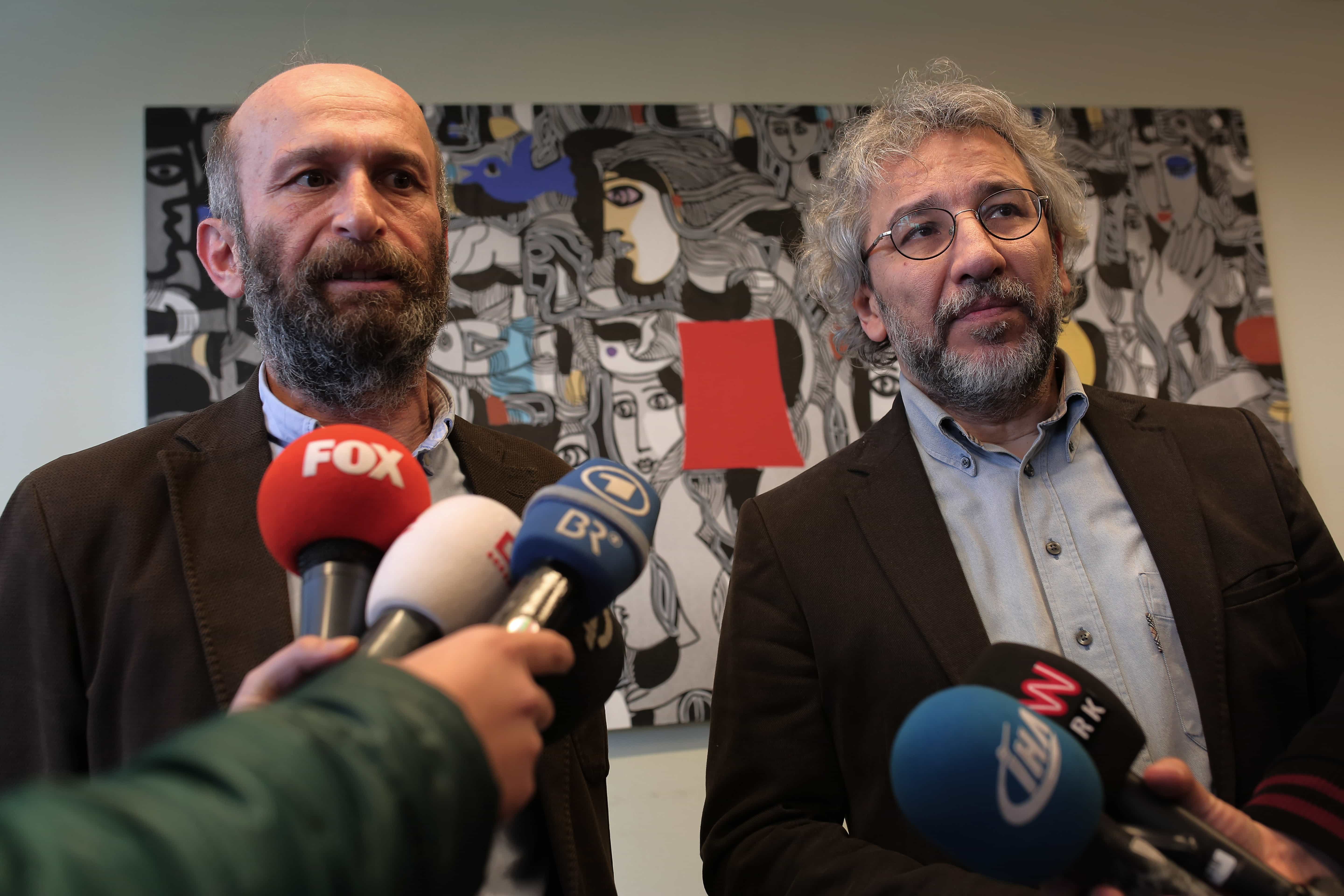 Can Dundar and Erdem Gul speak to the media at the headquarters of Cumhuriyet in Istanbul, after their release on 26 February 2016, AP Photo/Can Erok