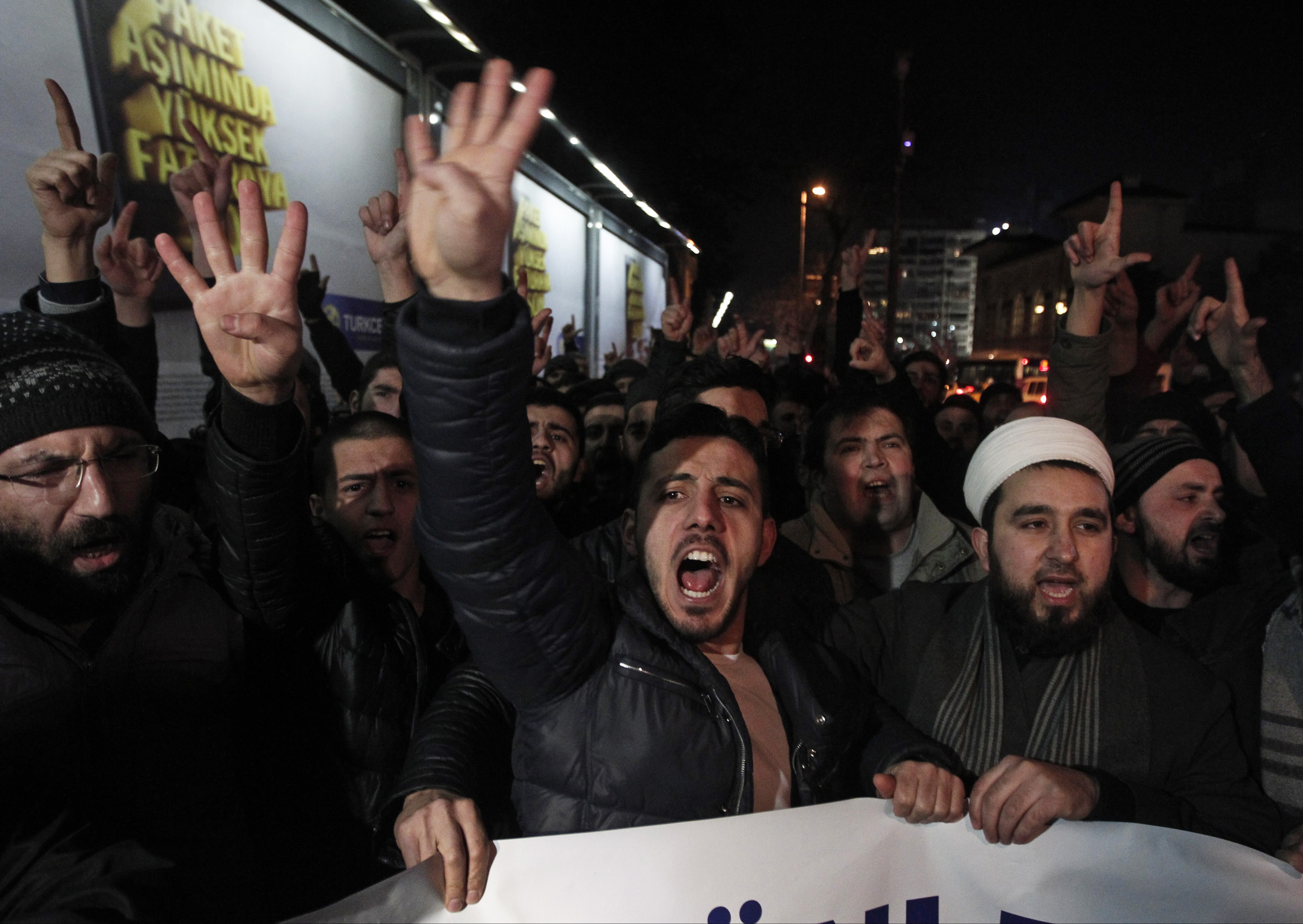 Demonstrators shout slogans during a demonstration against Turkish daily Cumhuriyet, in Istanbul, 14 January 2015, REUTERS/Osman Orsal