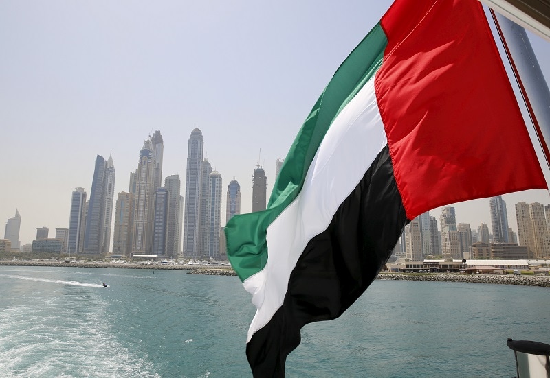 The UAE flag flies over a boat at Dubai Marina, Dubai, United Arab Emirates on May 22, 2015. , REUTERS/Ahmed Jadallah