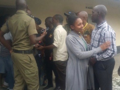 Joy Doreen Biira is received by relatives following her release from Kasese police station, in Western Uganda, HRNJ-Uganda