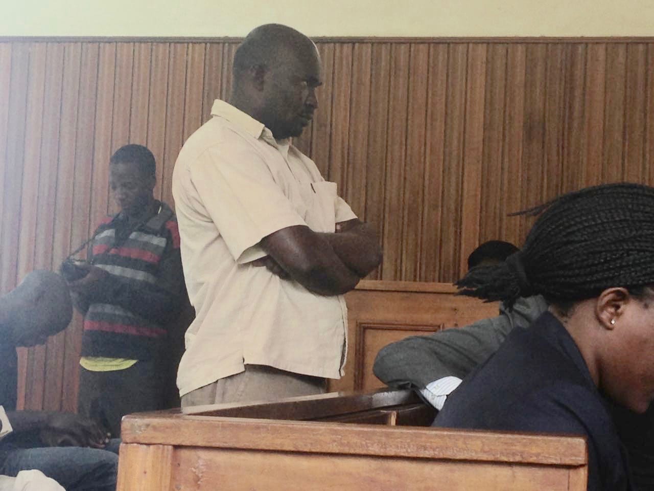 Eddie Ssansa standing in the dock during the court judgment, Eddie Bindhe