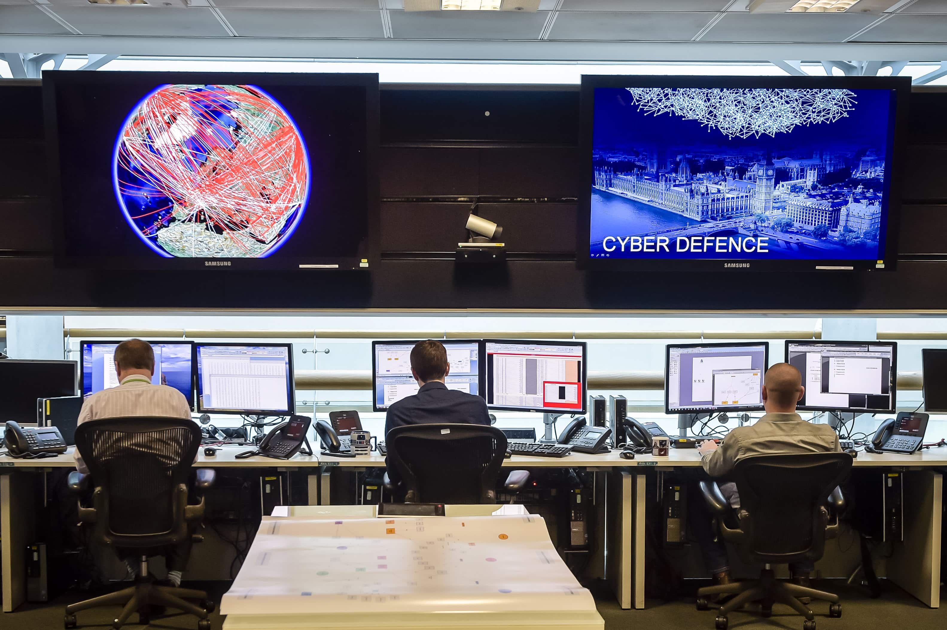 People sit at computers in the 24 hour Operations Room inside GCHQ, in Cheltenham, U.K., 17 November 2015, REUTERS/Ben Birchall/Pool